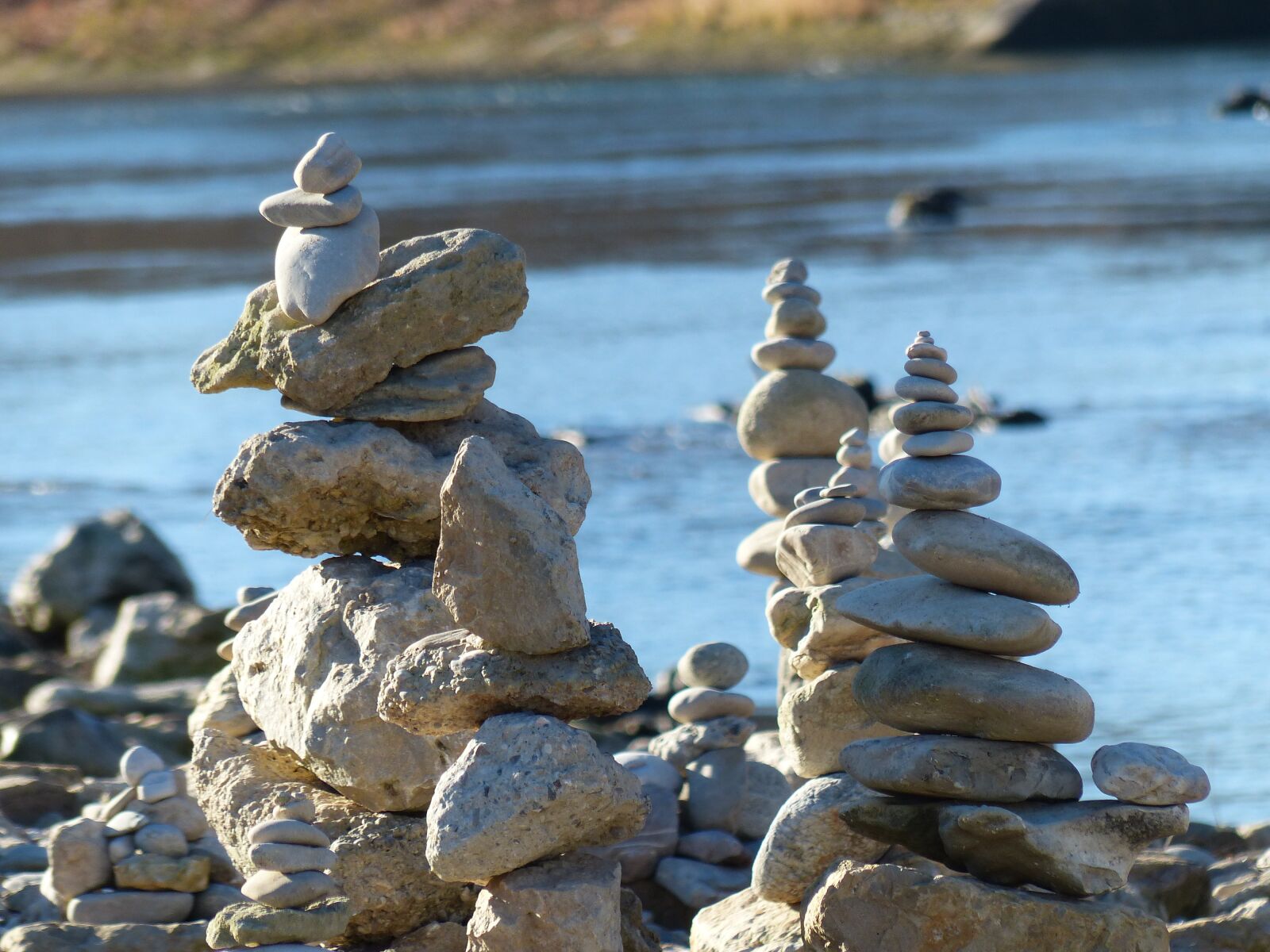 Panasonic Lumix DMC-FZ200 sample photo. Cairn, water, river photography
