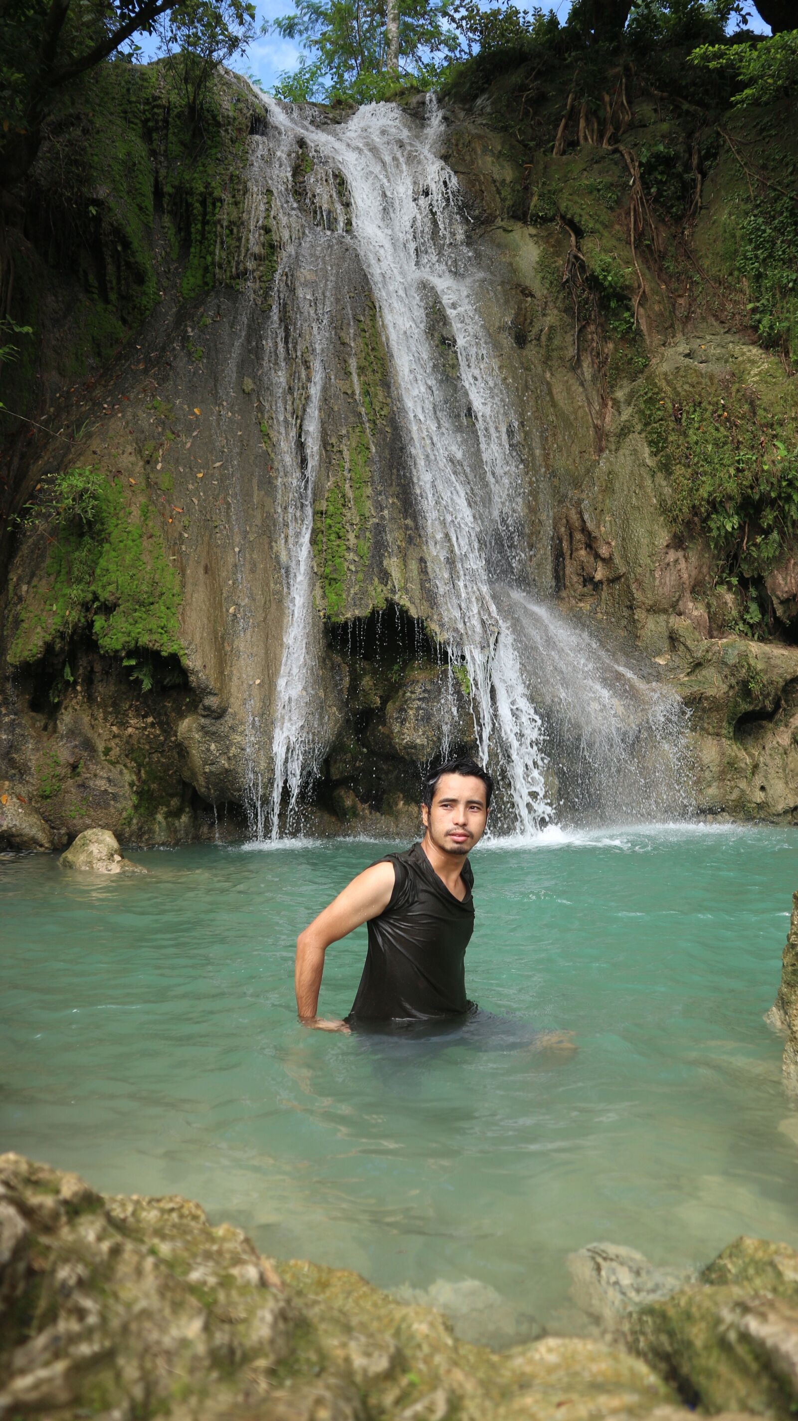 Canon EOS M10 sample photo. Candid, waterfall, guy photography