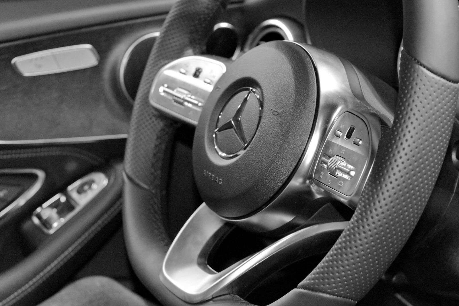 Nikon D5500 sample photo. Monochrome, steering wheel, car photography
