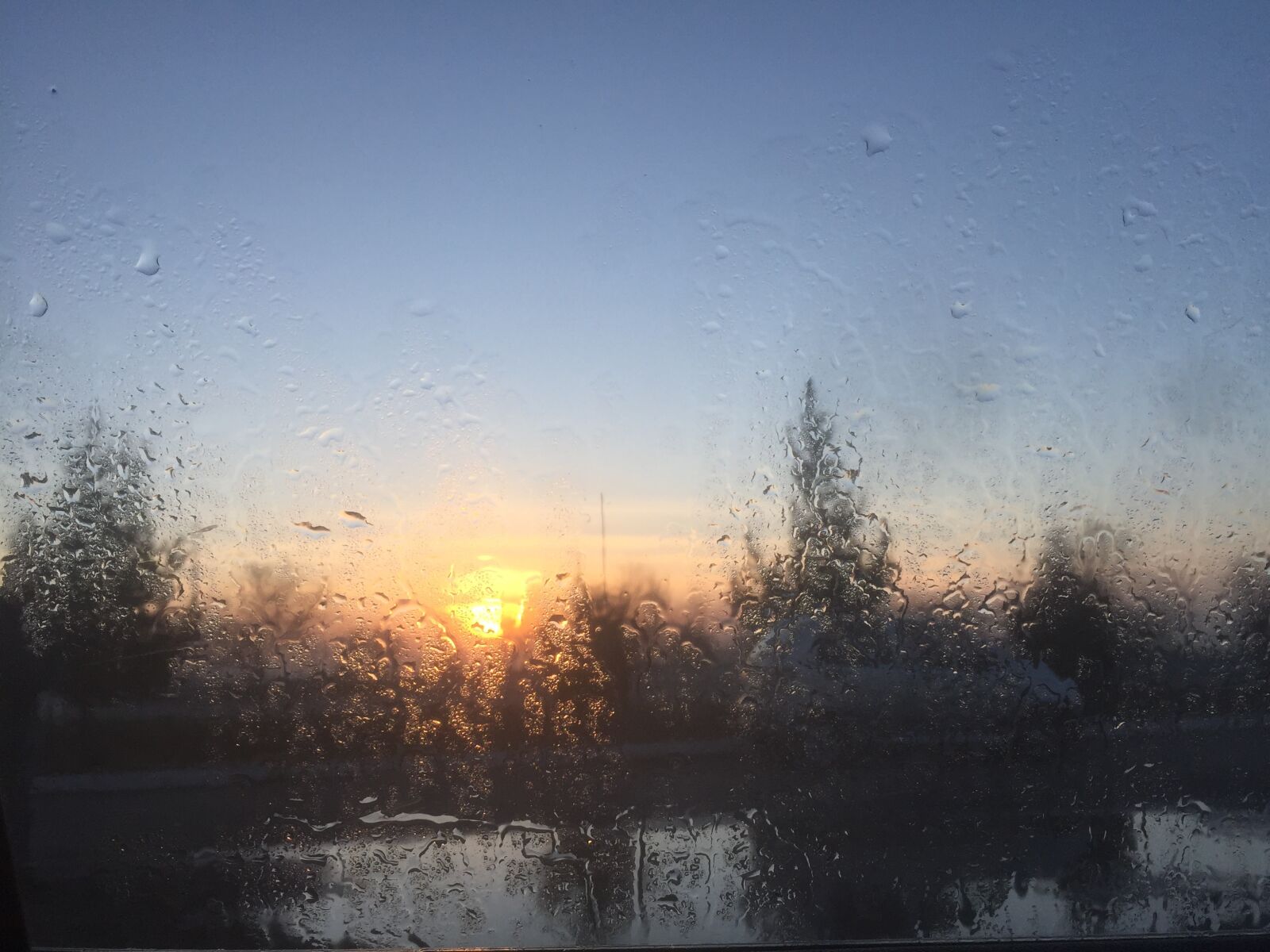 iPhone 6 back camera 4.15mm f/2.2 sample photo. Sunset, rain, landscape photography