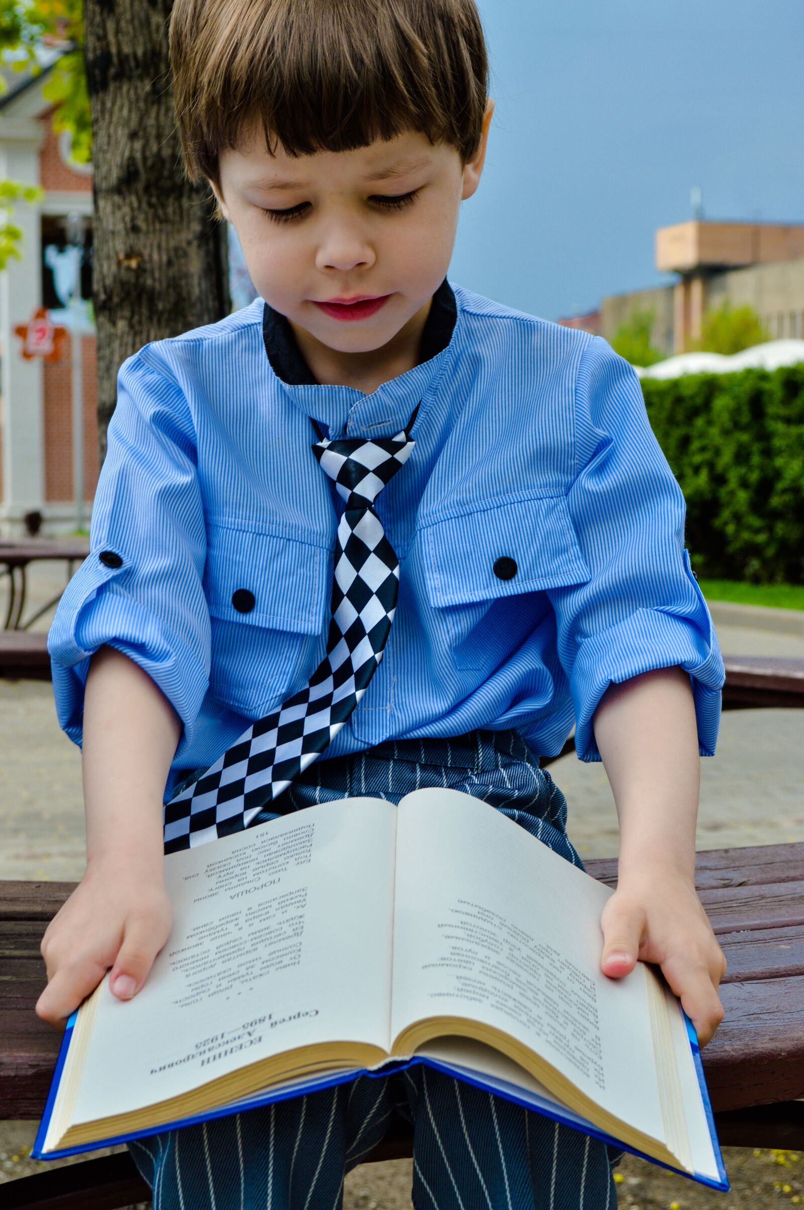 Nikon D3200 sample photo. Boy, book, reads photography