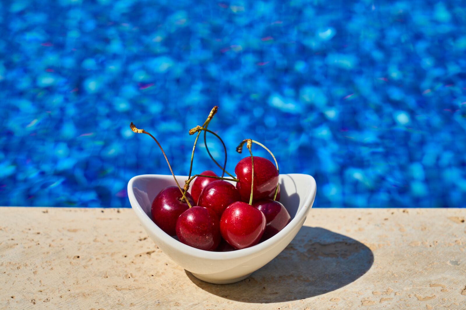 Sony a7R II sample photo. Cherry, pool, hotel photography