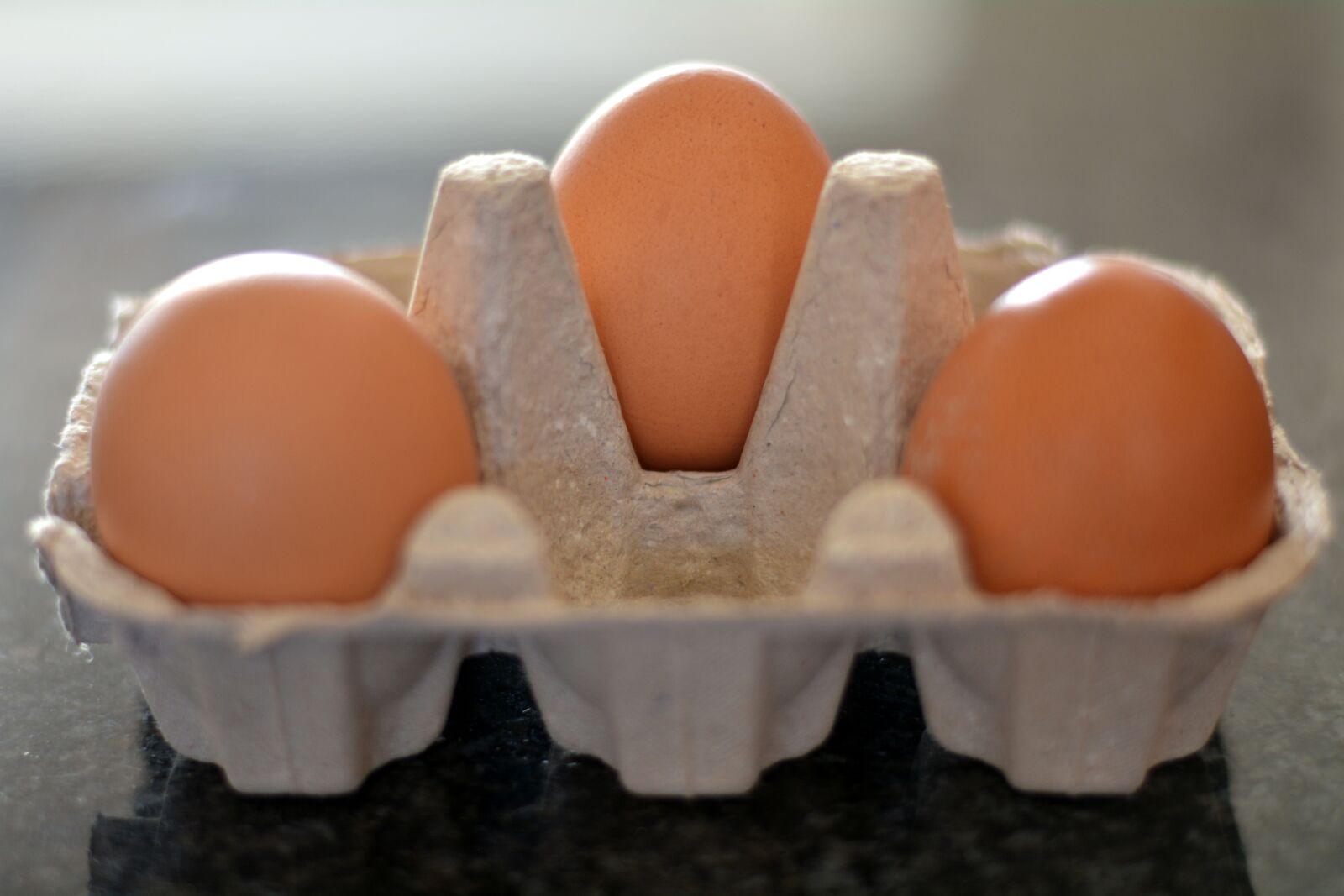 Nikon D5200 sample photo. Three eggs, container, food photography