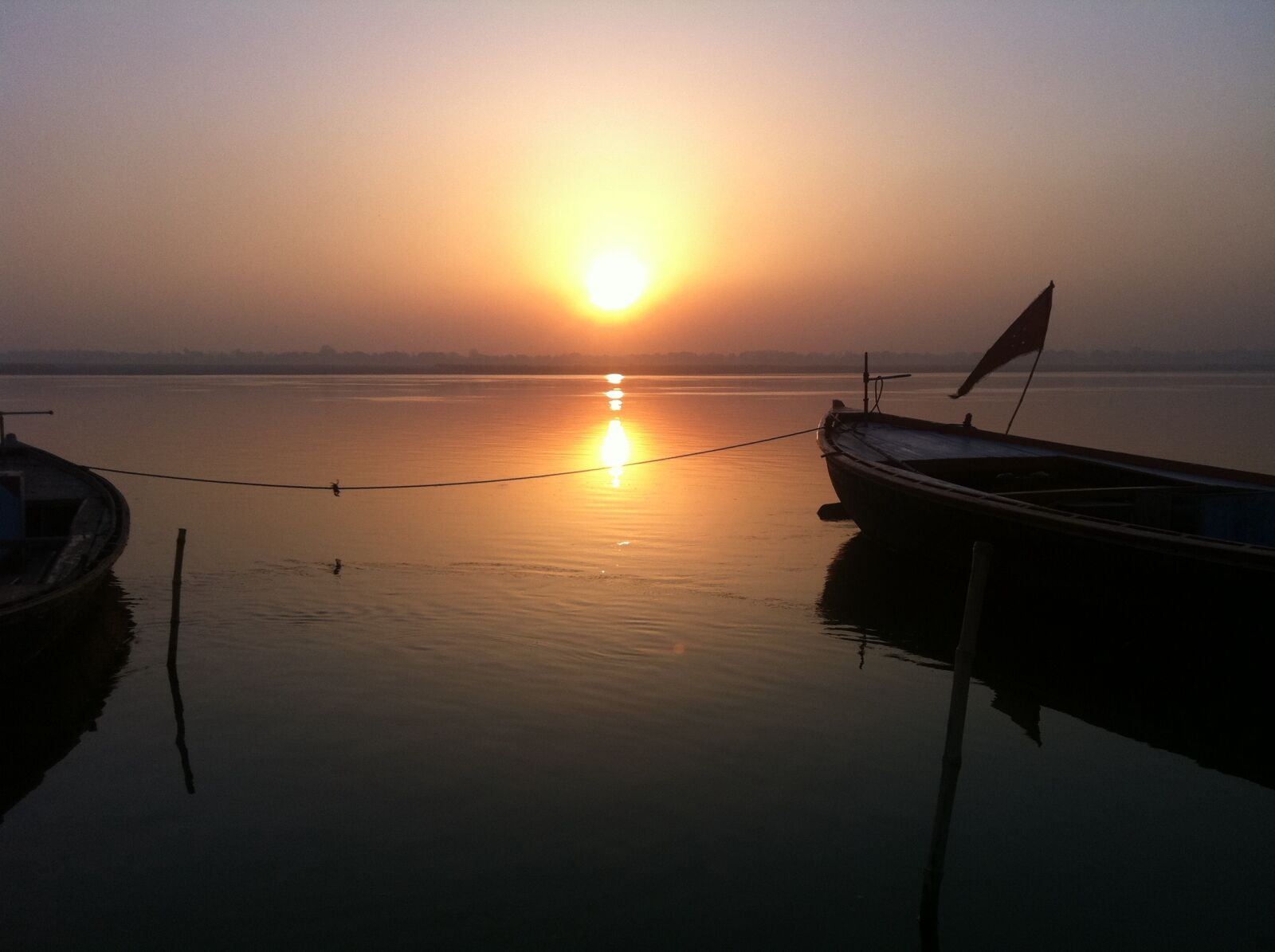 Apple iPhone 4 sample photo. Boat, flag, india, riverside photography