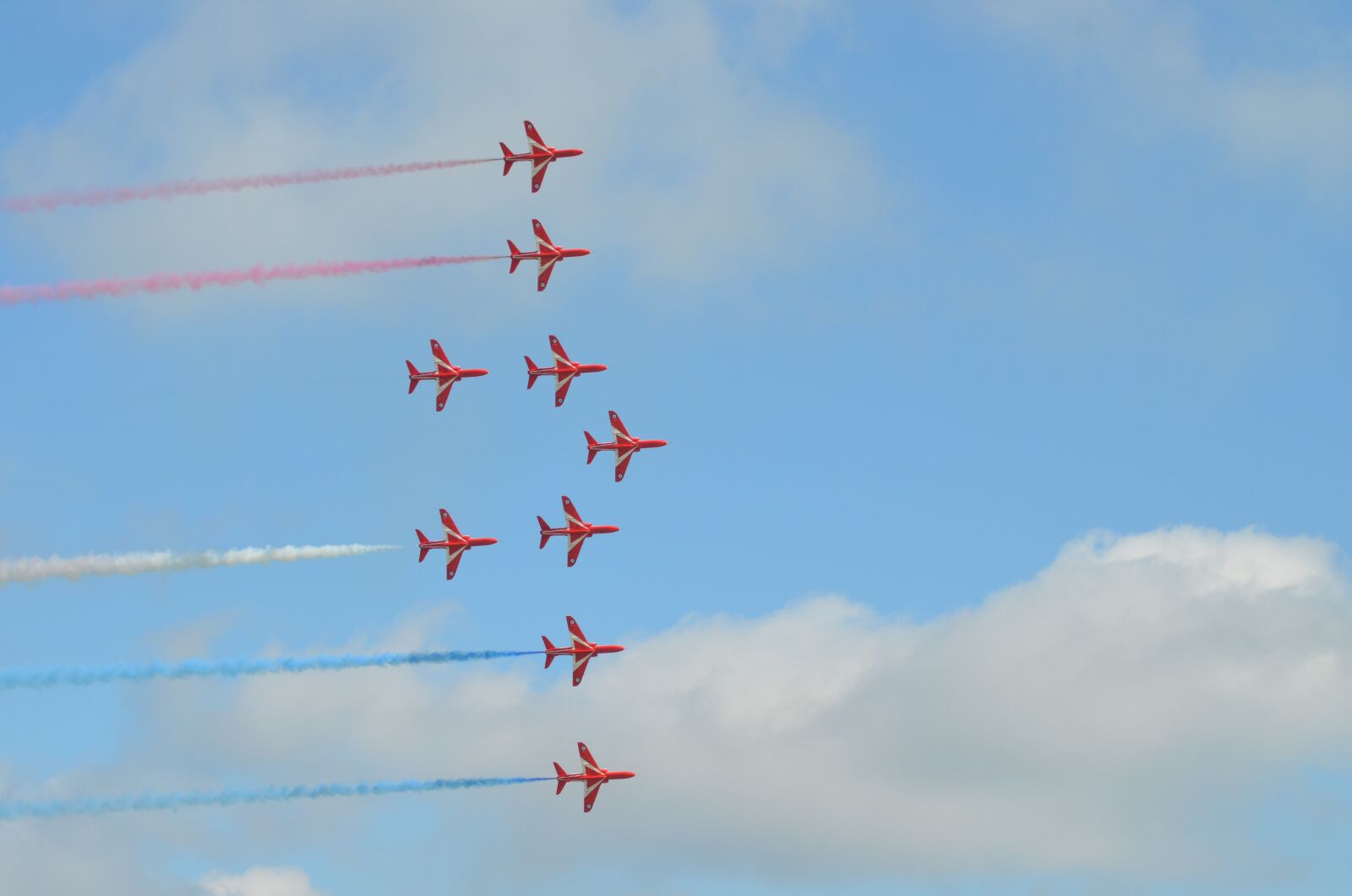 Nikon D7000 sample photo. Red arrows, stunt flying photography