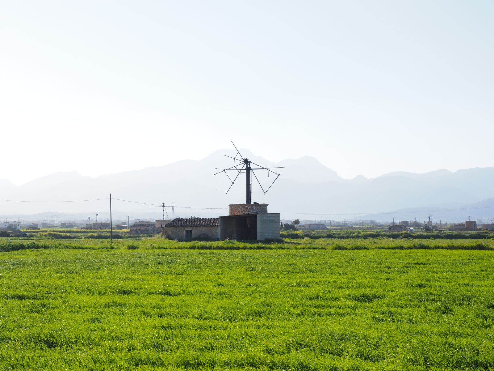 Olympus OM-D E-M1 + Olympus M.Zuiko Digital ED 12-40mm F2.8 Pro sample photo. Windmill, old, lapsed photography