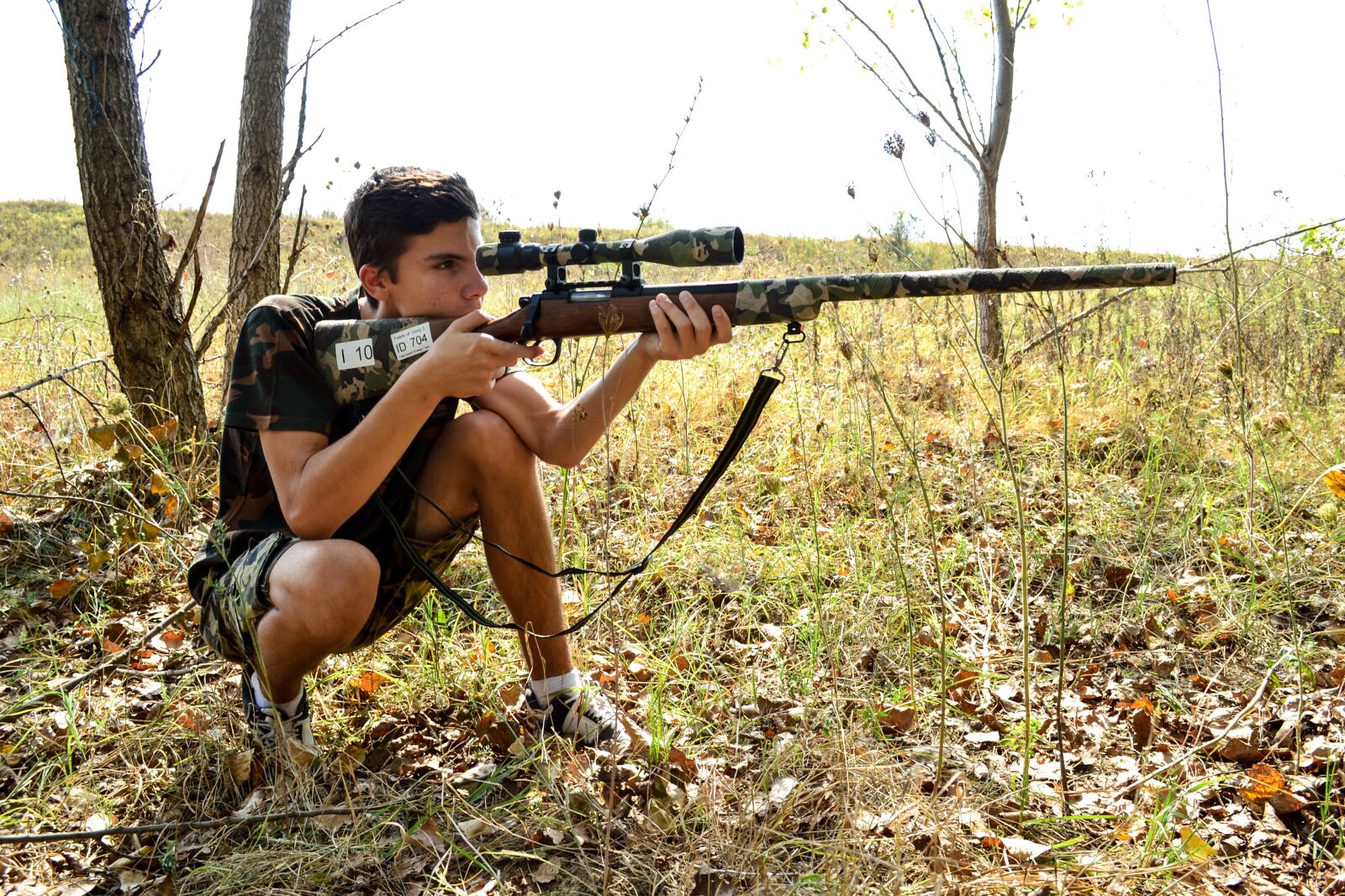Nikon D3100 sample photo. Sniper, guy, rifle photography