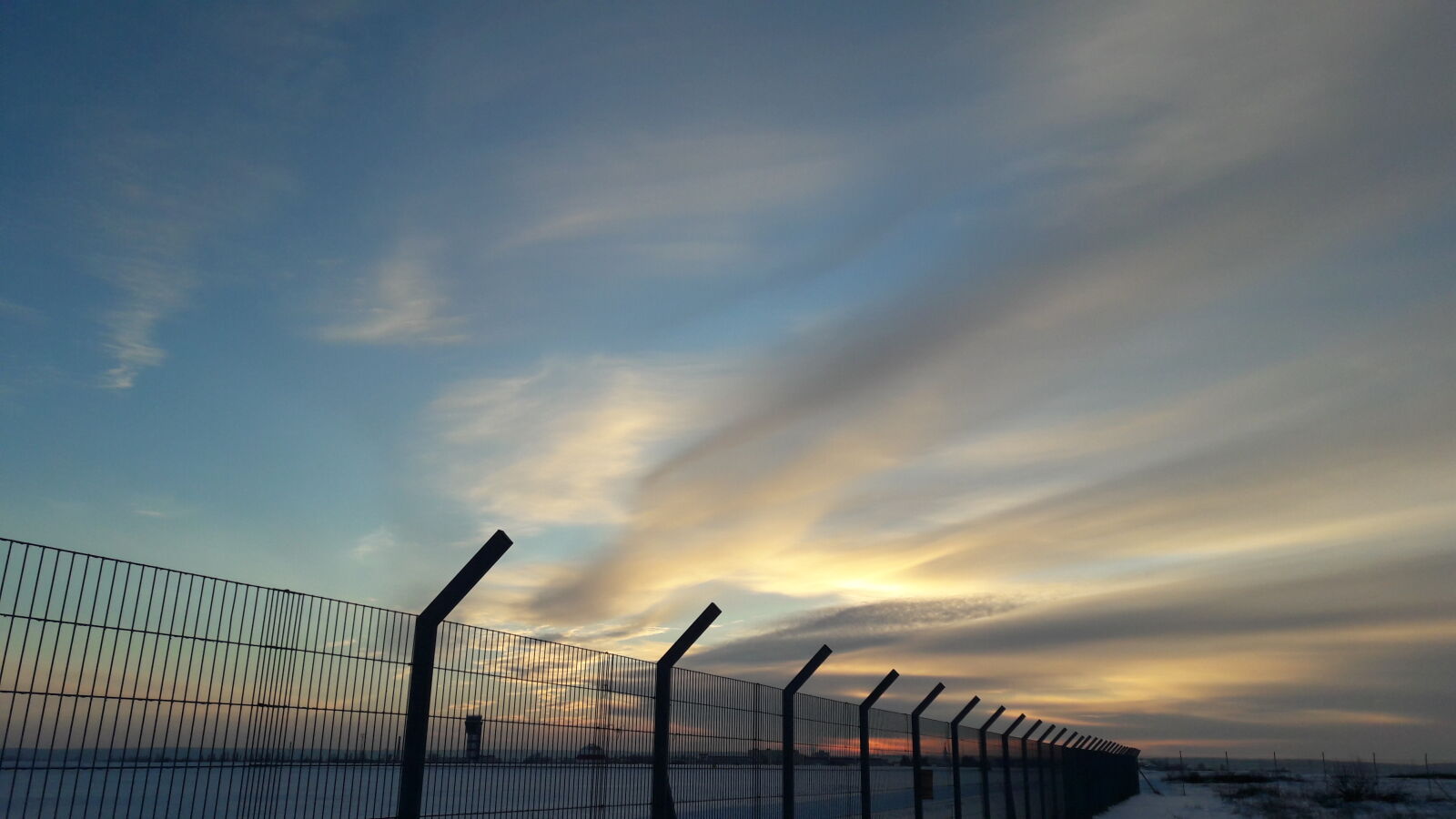 Samsung Galaxy A5(2016) sample photo. Clouds, fence, silhouette, sky photography