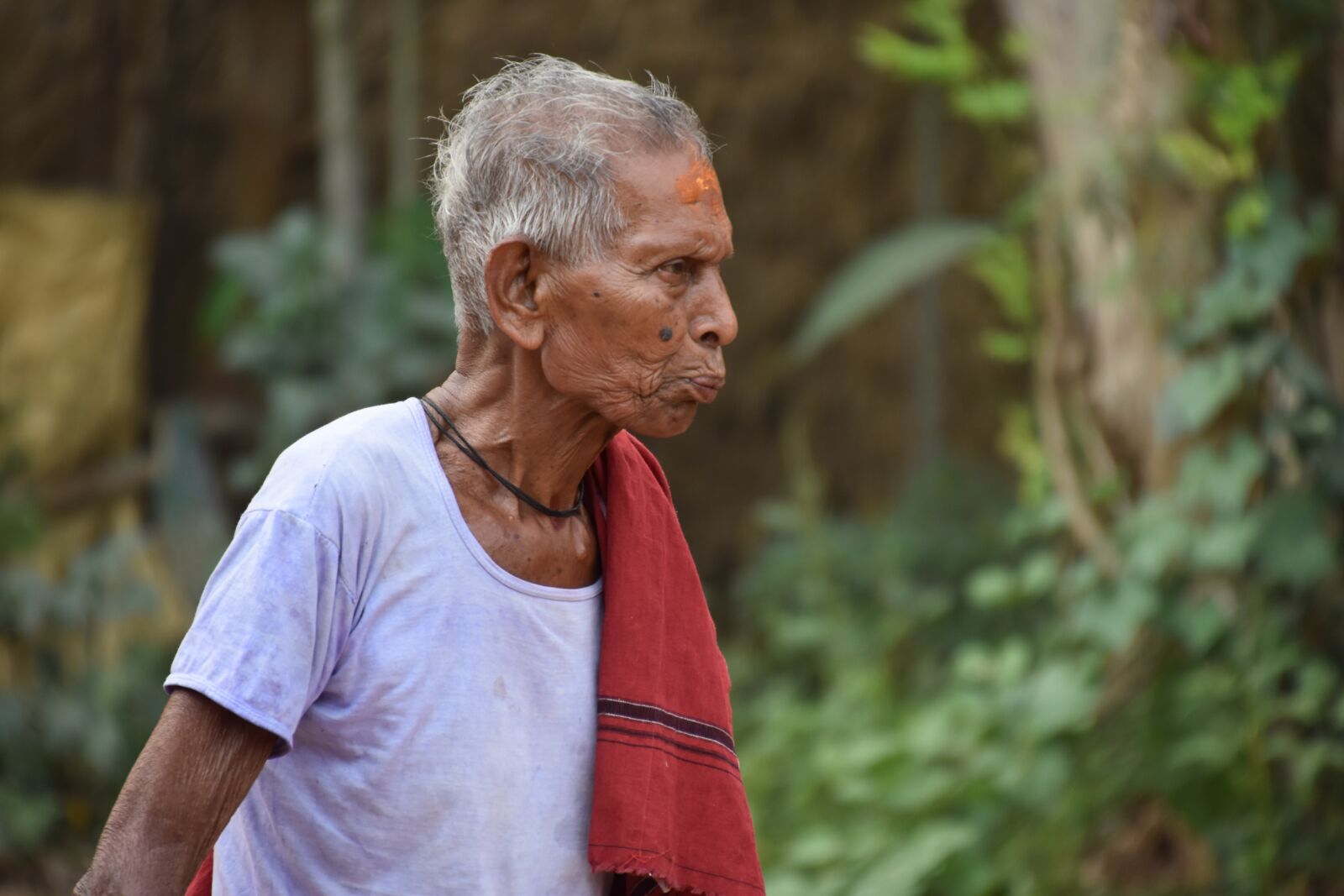 Nikon D5600 sample photo. Odisha, man, towel photography