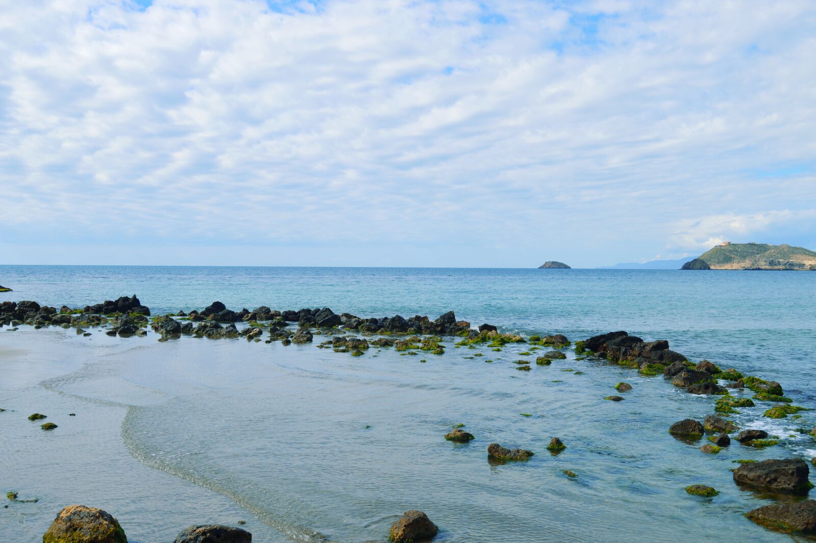 Nikon D3200 sample photo. Beach with rocks, beach photography