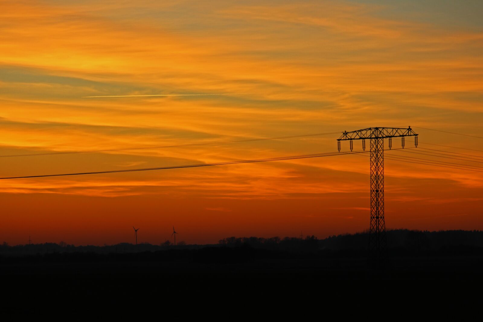 Canon EF-S 55-250mm F4-5.6 IS STM sample photo. Sunset, strommast, current photography