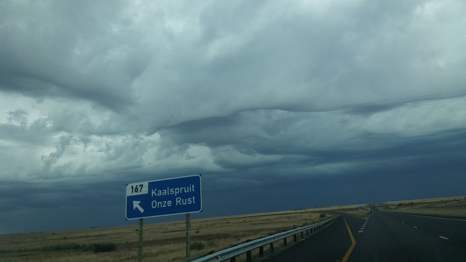 LG G3 sample photo. Road, road, signs, thunderstorm photography