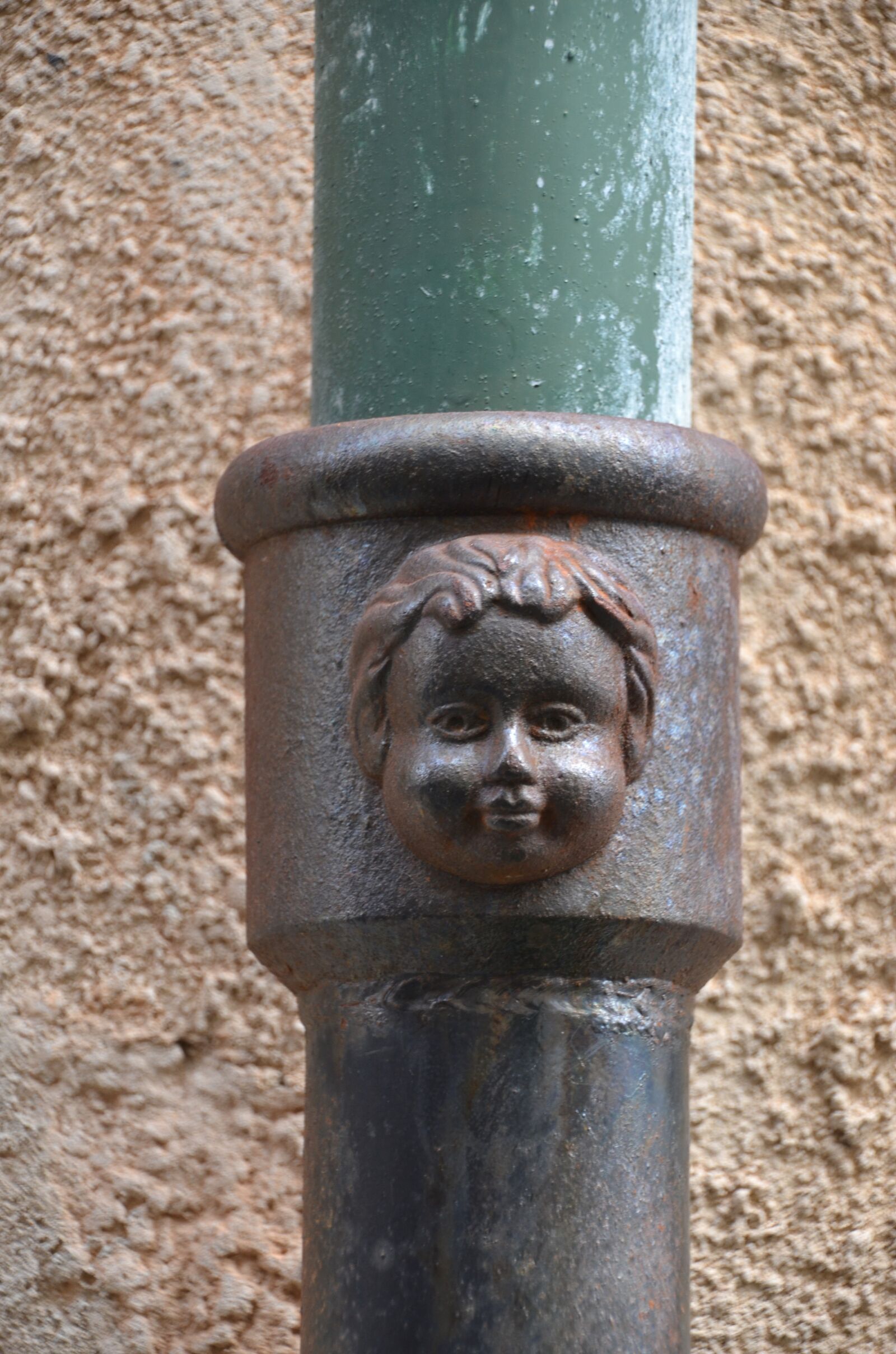 Nikon D5100 sample photo. Face, metal, sculpture photography
