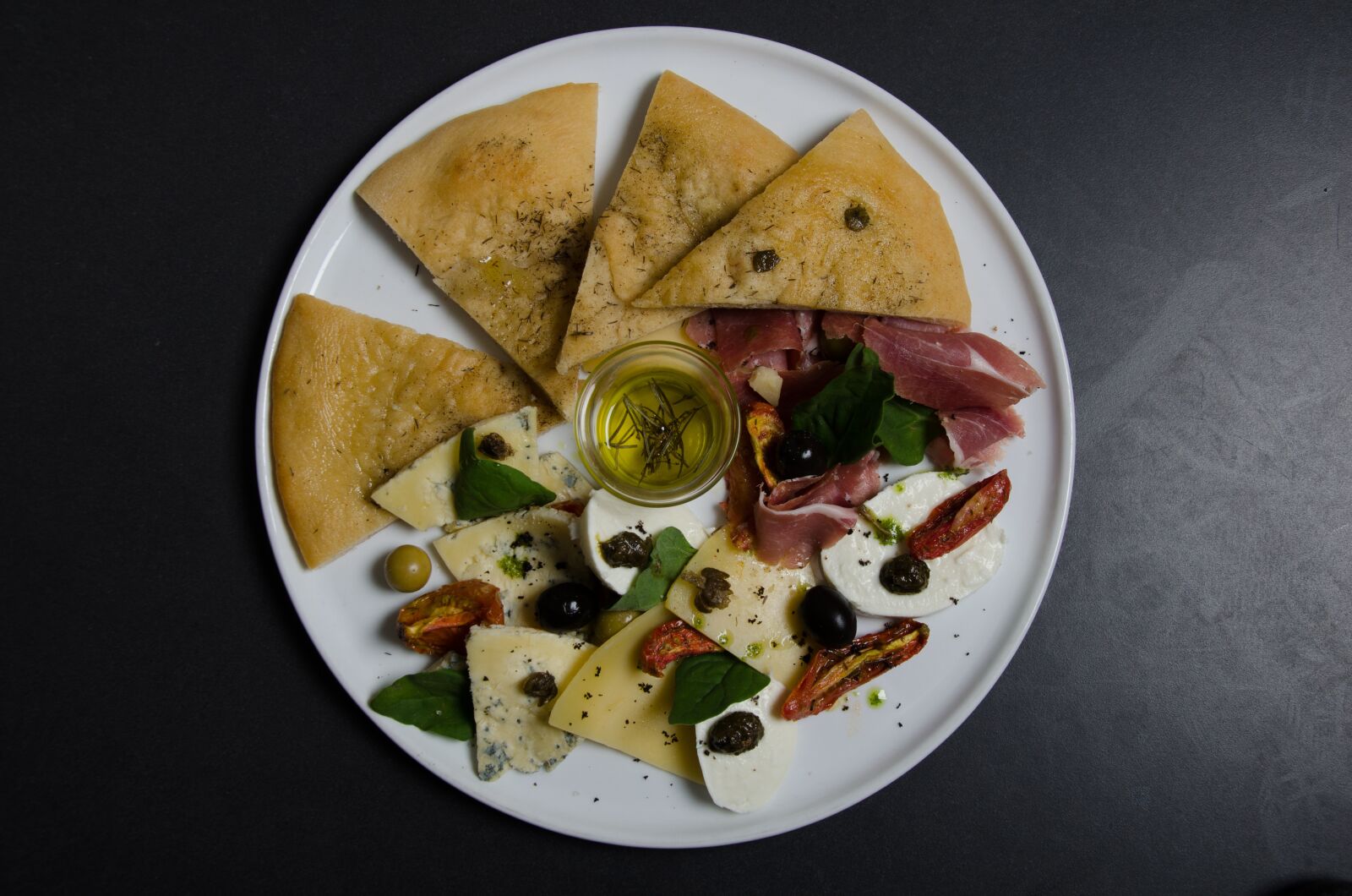 Nikon D7000 sample photo. Foccacia with olives, tasting photography
