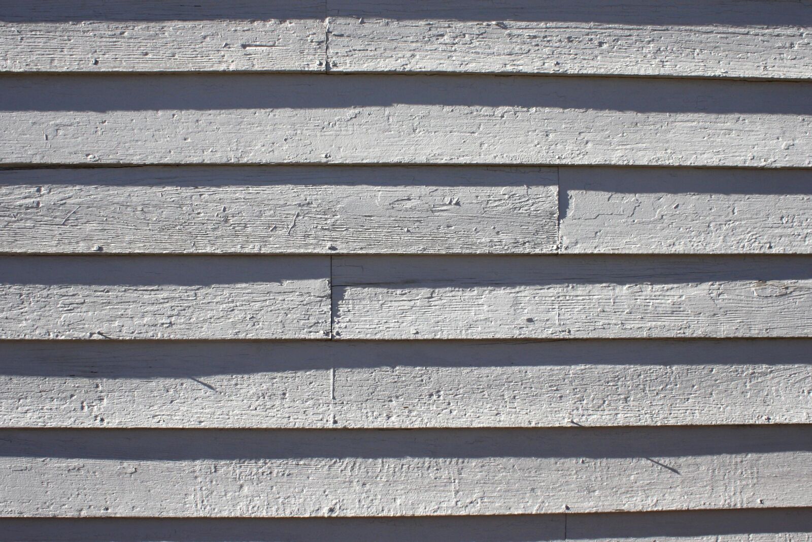 f/3.5-5.6 IS sample photo. Wooden planks, gray color photography
