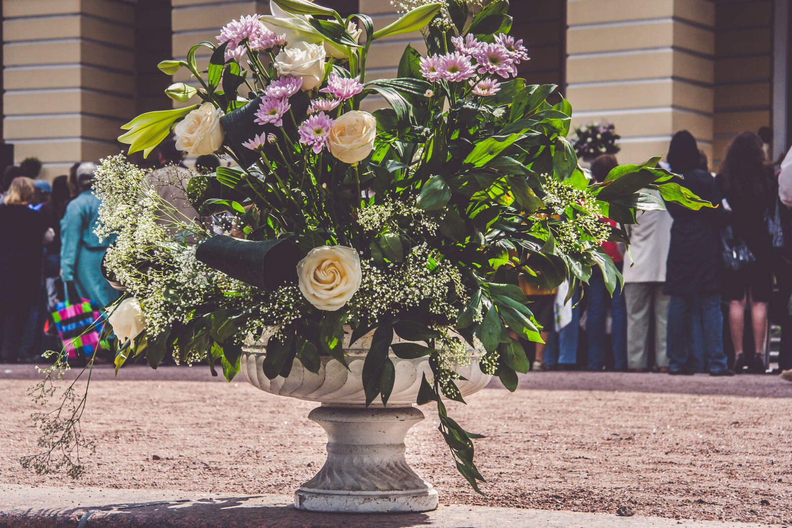 Canon EF-S 17-85mm F4-5.6 IS USM sample photo. Flowers, people photography