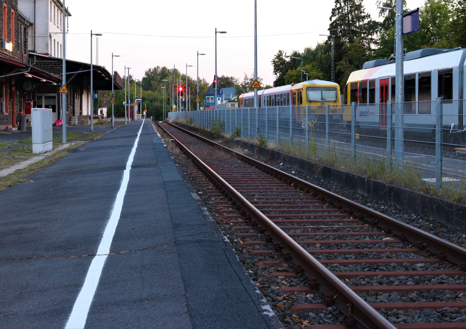 Canon EF 35mm F2 IS USM sample photo. Platform, railcar, railway station photography