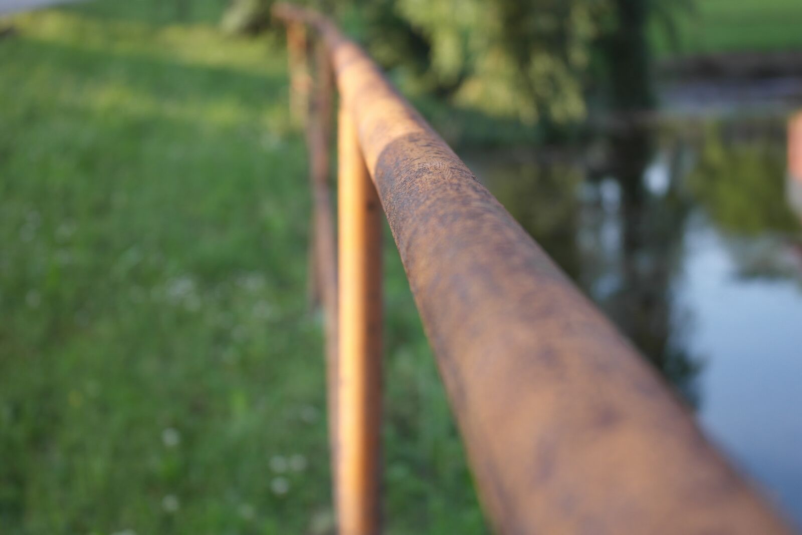 Samsung NX1000 sample photo. Railing, old, water photography
