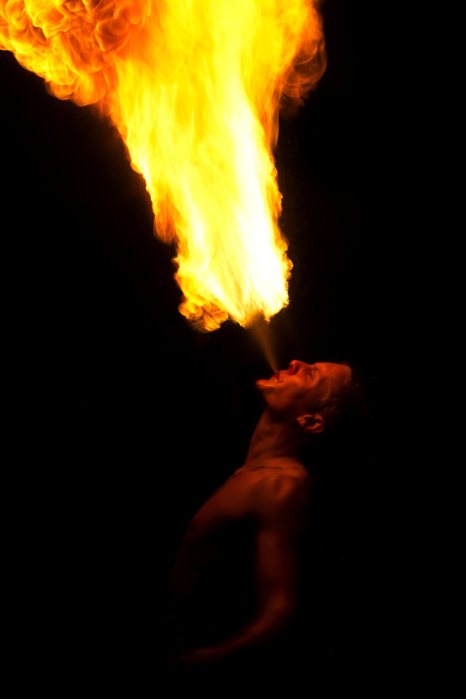 Canon EOS 600D (Rebel EOS T3i / EOS Kiss X5) sample photo. Fire, breathing, person photography