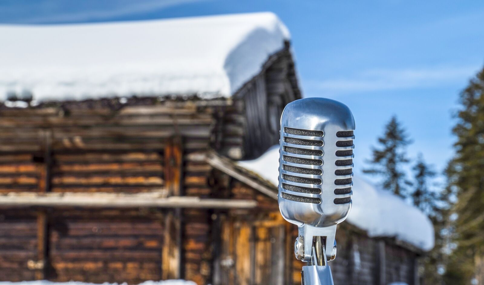 Sony a7S + Sony E PZ 18-200mm F3.5-6.3 OSS sample photo. Snow, hut, microphone photography