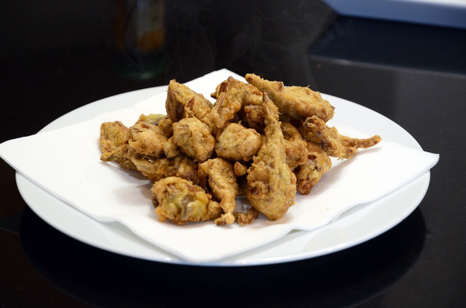 Nikon D7000 sample photo. Golden, fried, artichokes photography