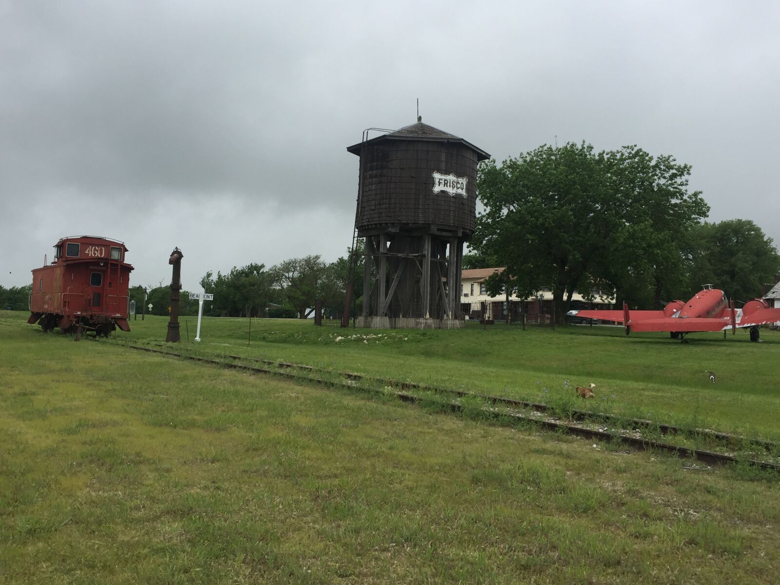 iPhone 6 back camera 4.15mm f/2.2 sample photo. Plane, water tower, train photography