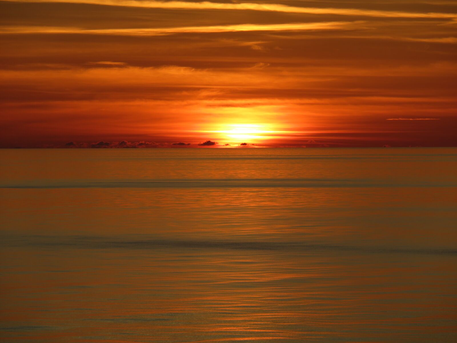 Canon PowerShot SX710 HS sample photo. Sunset ocean, waves, calm photography