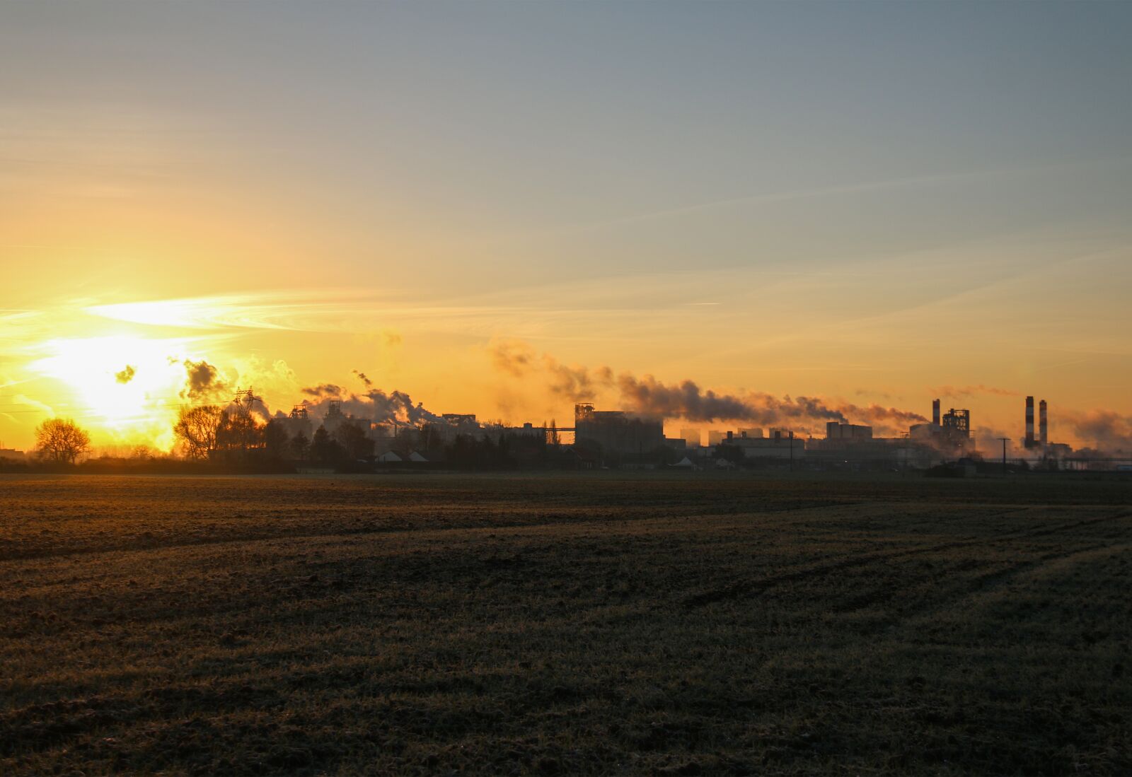 Canon EF-S 18-200mm F3.5-5.6 IS sample photo. Sunrise, factory, field photography