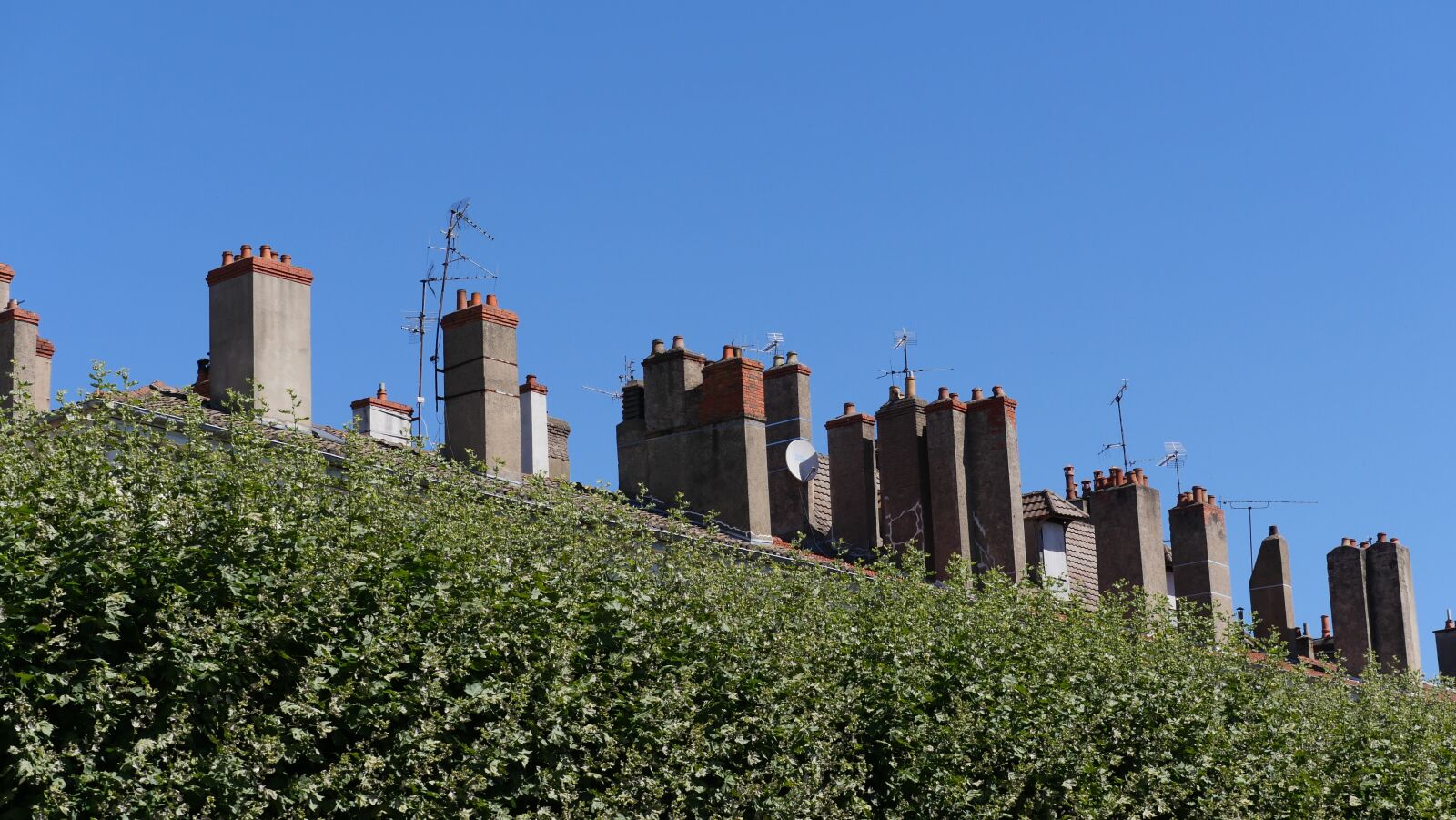 Panasonic Lumix DMC-GX8 sample photo. Chimneys, roofs, roof photography