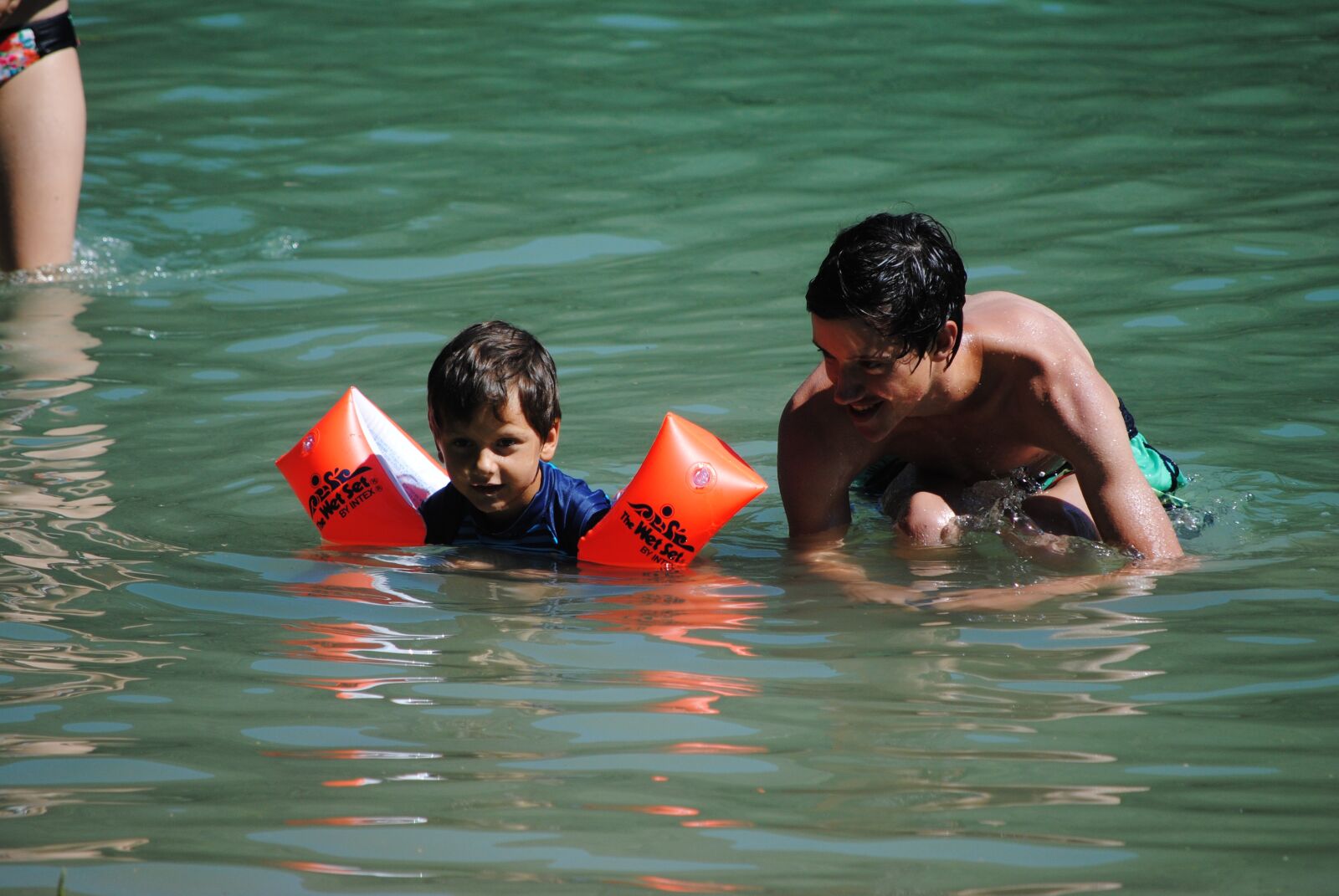 Nikon D3000 sample photo. Brothers, summer, jump photography