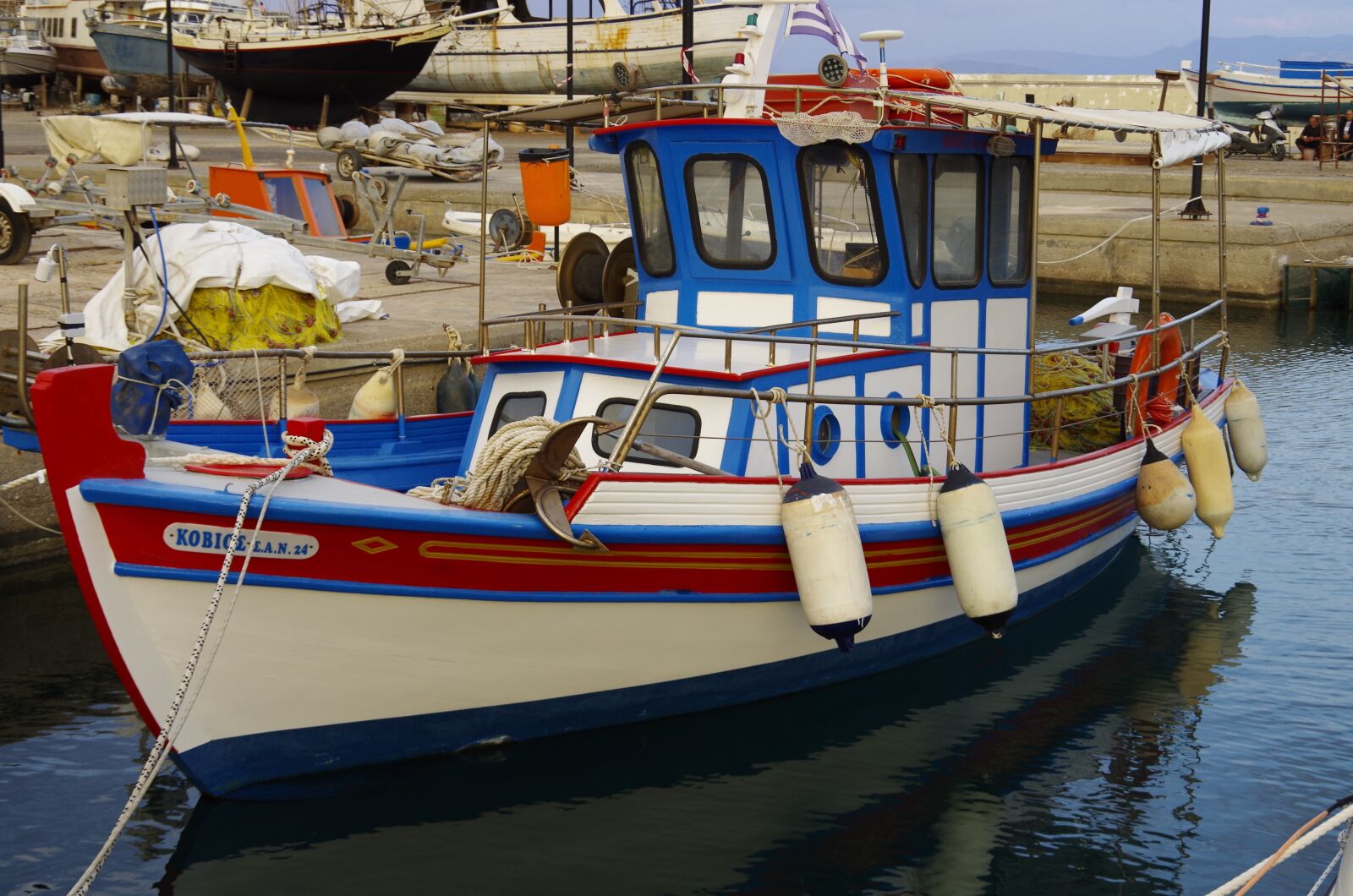 Pentax K-50 sample photo. Crete, marina, traditional boat photography