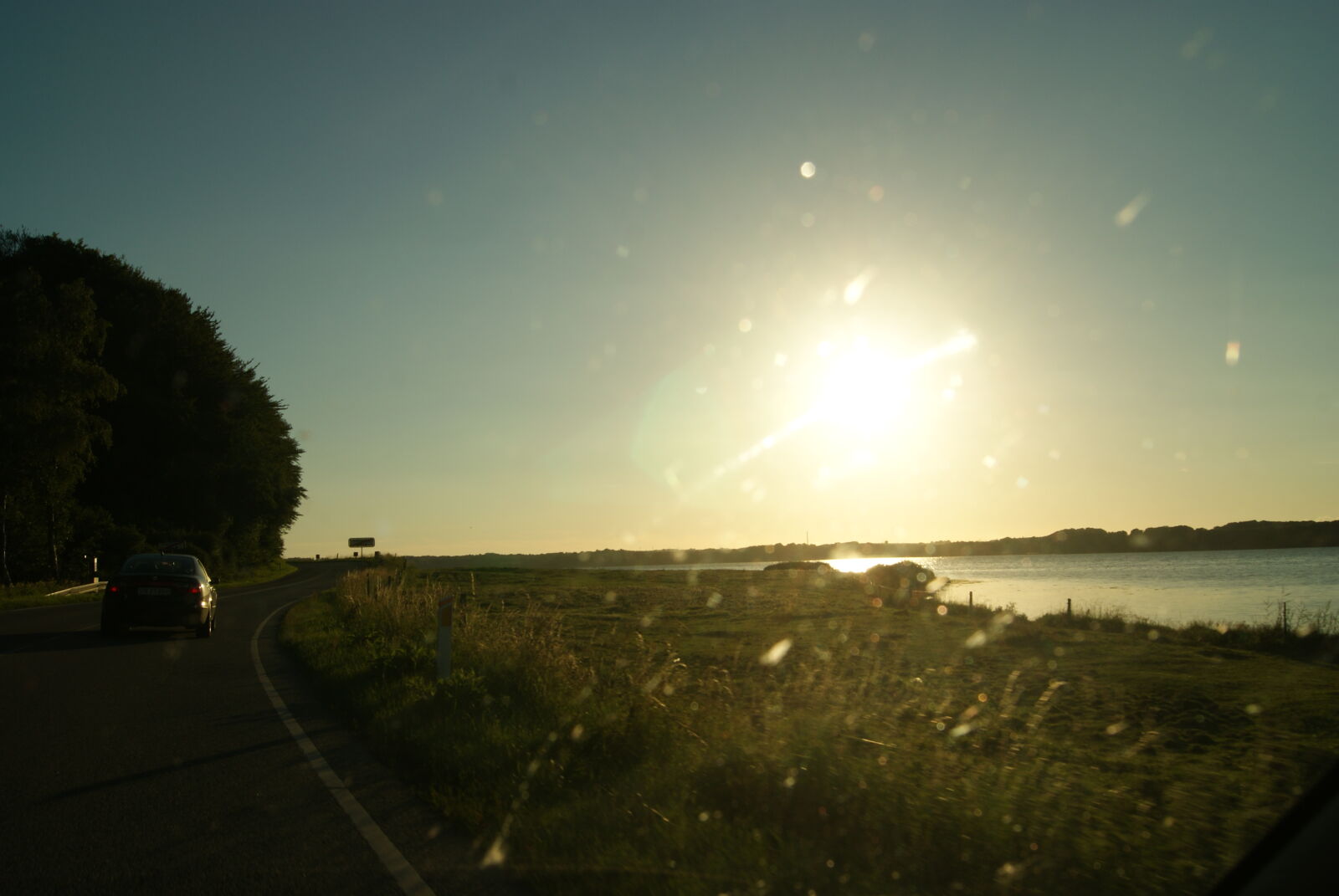 Sony Alpha DSLR-A230 sample photo. Denmark, horizon, road, seashore photography