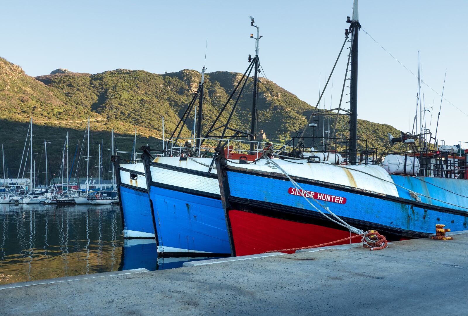 Olympus M.Zuiko Digital ED 12-100mm F4.0 IS Pro sample photo. Fishing boats, berth, jetty photography