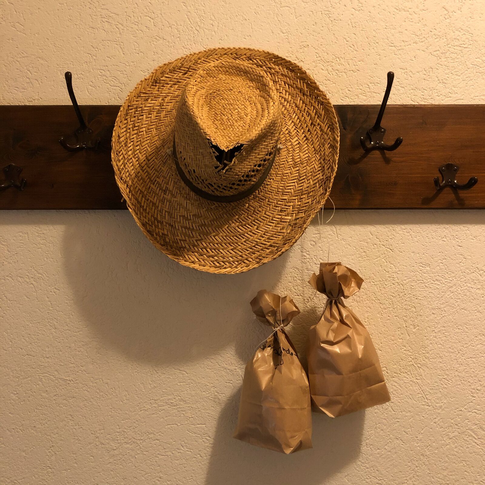 iPhone X back dual camera 4mm f/1.8 sample photo. Hat, wardrobe, rustic photography