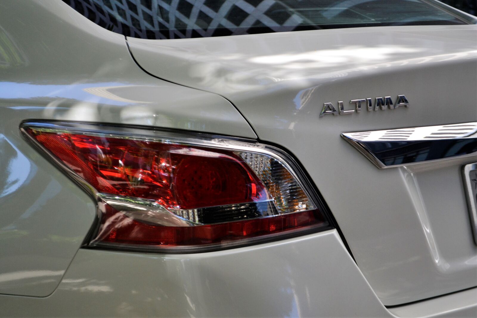 Nikon D3100 sample photo. Nissan altima, white car photography