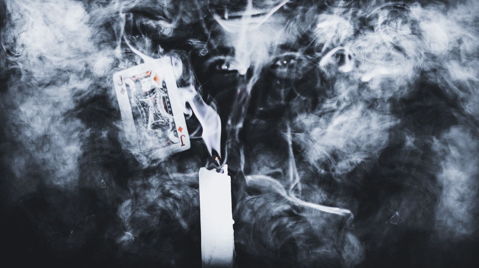 Canon EOS 1100D (EOS Rebel T3 / EOS Kiss X50) sample photo. Joker, candle, smoke photography