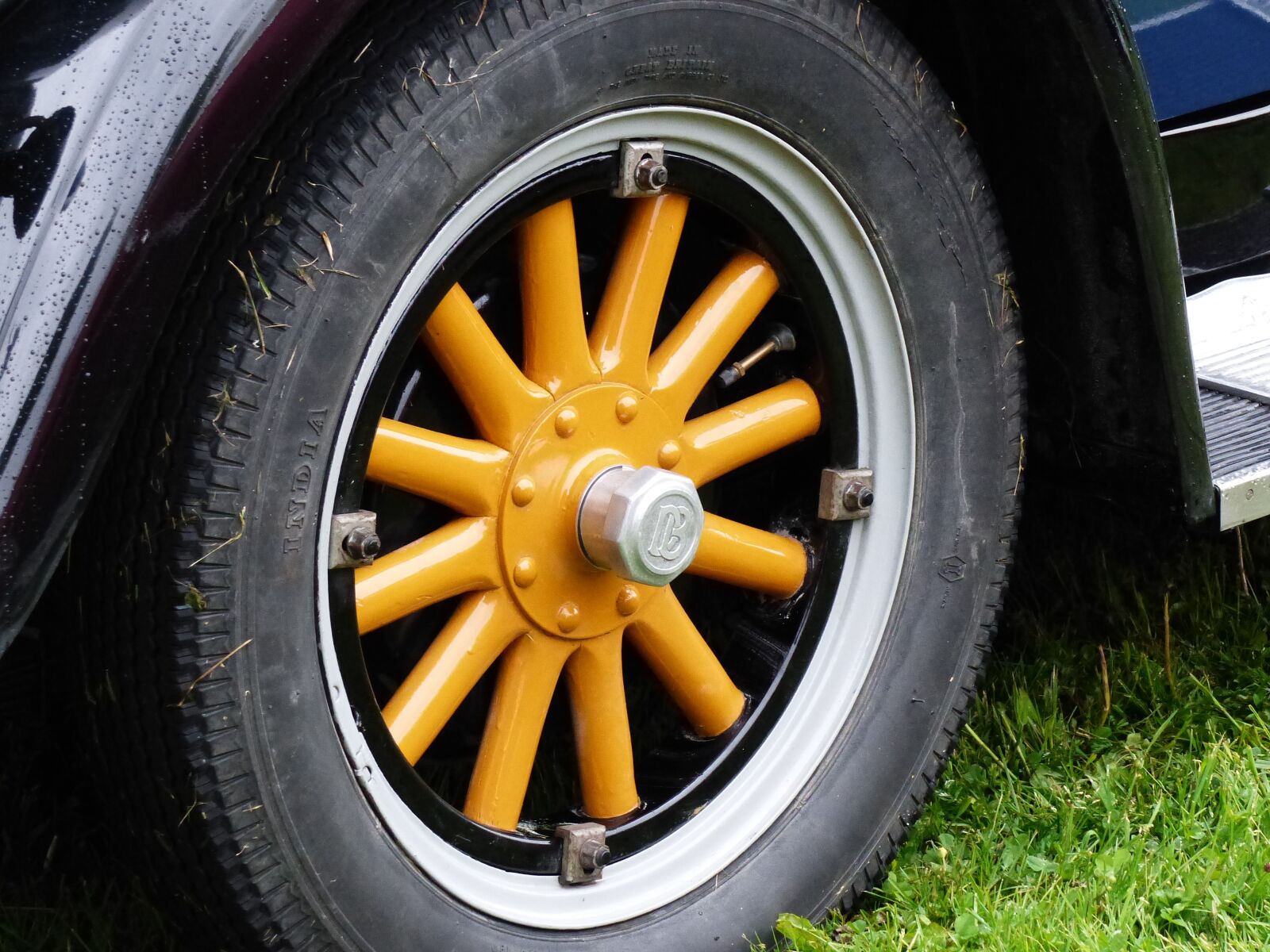 Panasonic Lumix DMC-FZ200 sample photo. Car tyres, car, tr photography