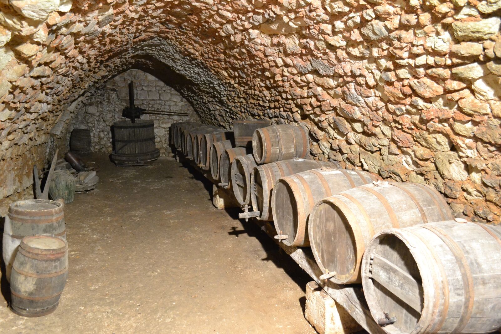 Nikon D3100 sample photo. Cave, barrel, wine press photography