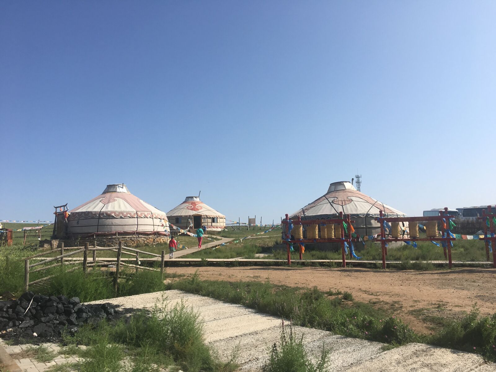 iPhone 6s back camera 4.15mm f/2.2 sample photo. Prairie, grassland, yurts photography