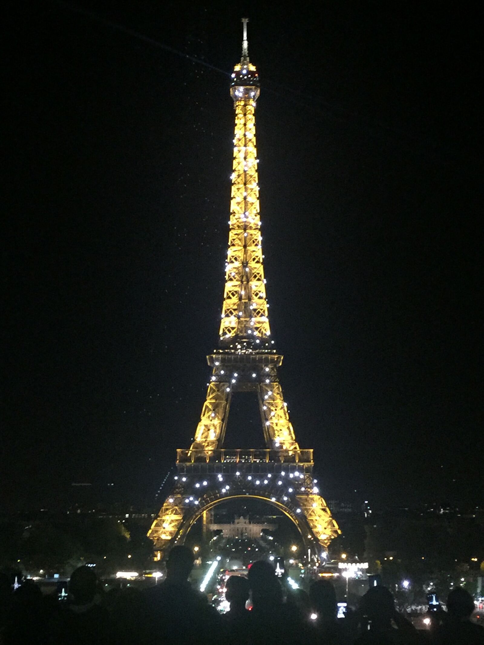iPhone 6 back camera 4.15mm f/2.2 sample photo. Eiffel tower, night, paris photography