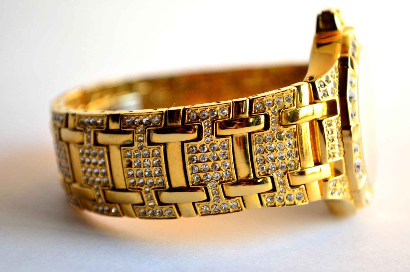 Nikon D5100 sample photo. Gold, wrist watch, luxury photography