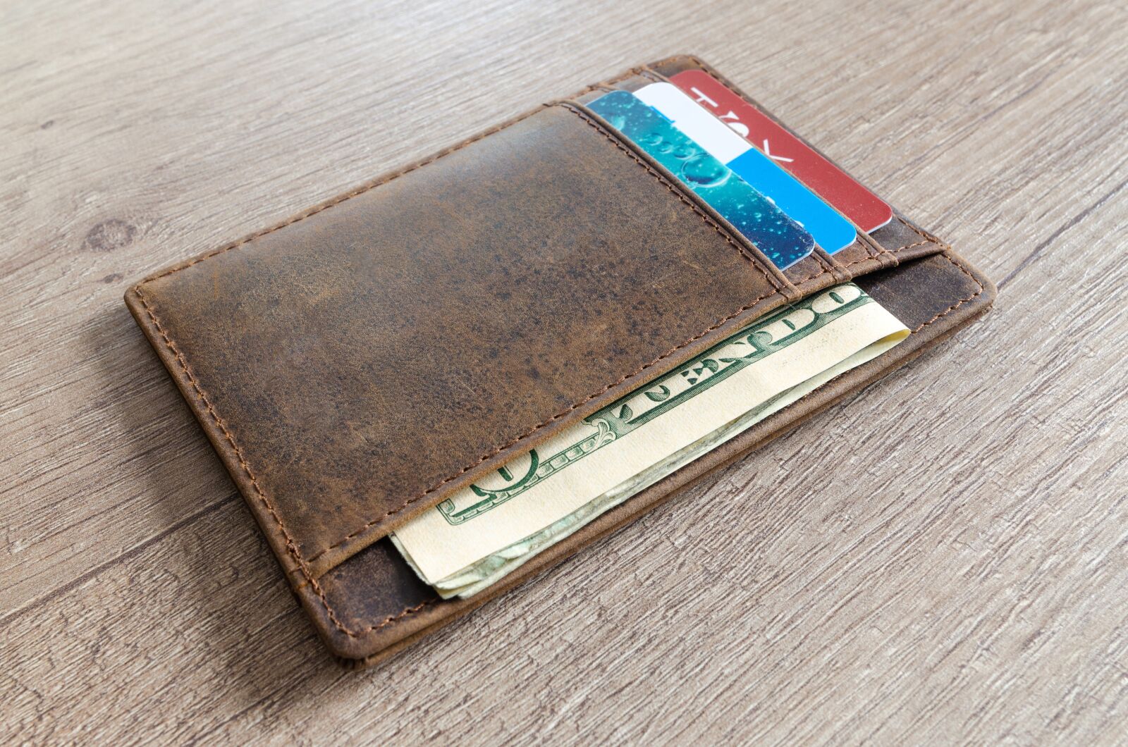 Nikon D5100 sample photo. Leather, finance, money photography