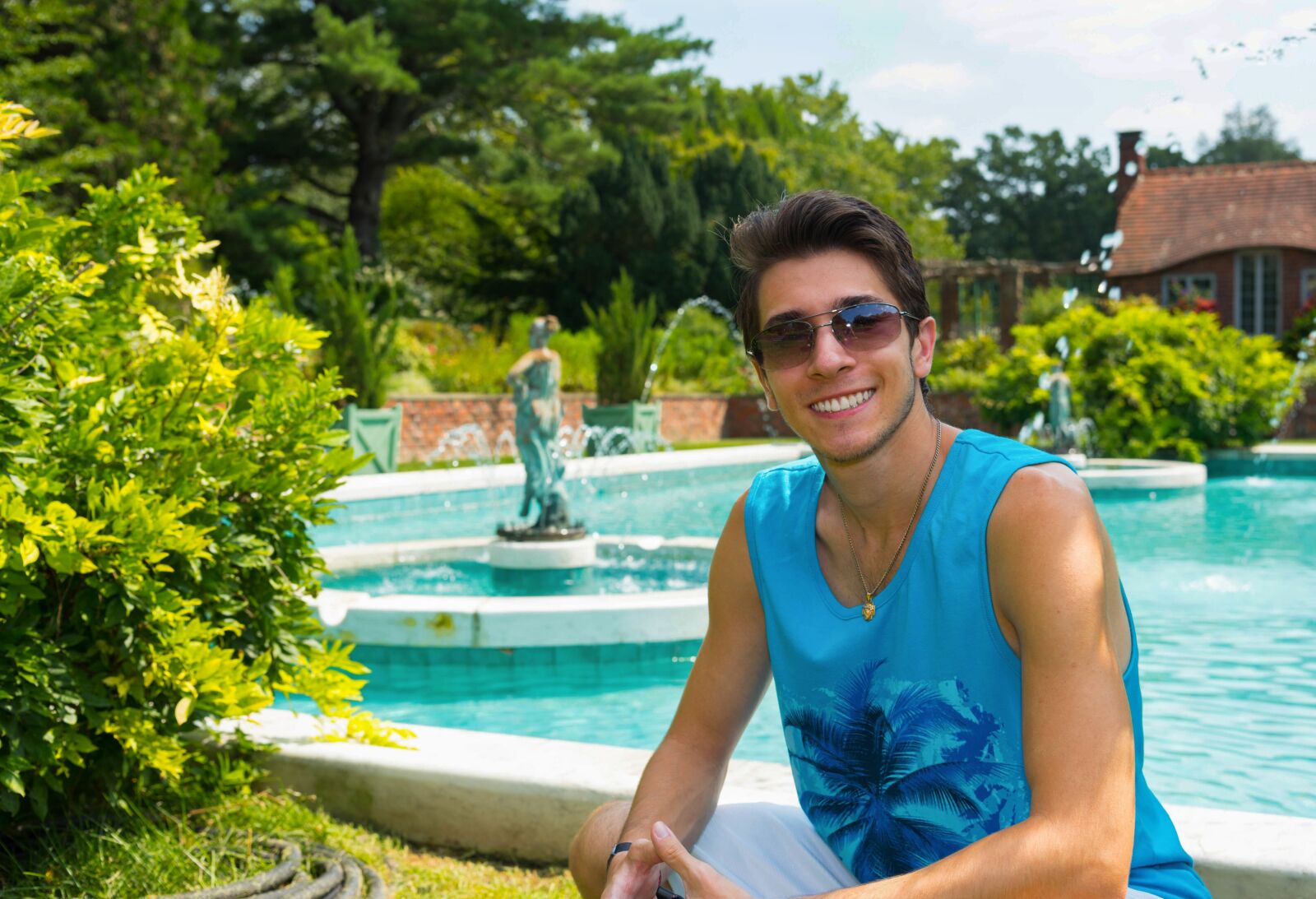 Nikon D750 sample photo. Young man, sunglasses, smile photography