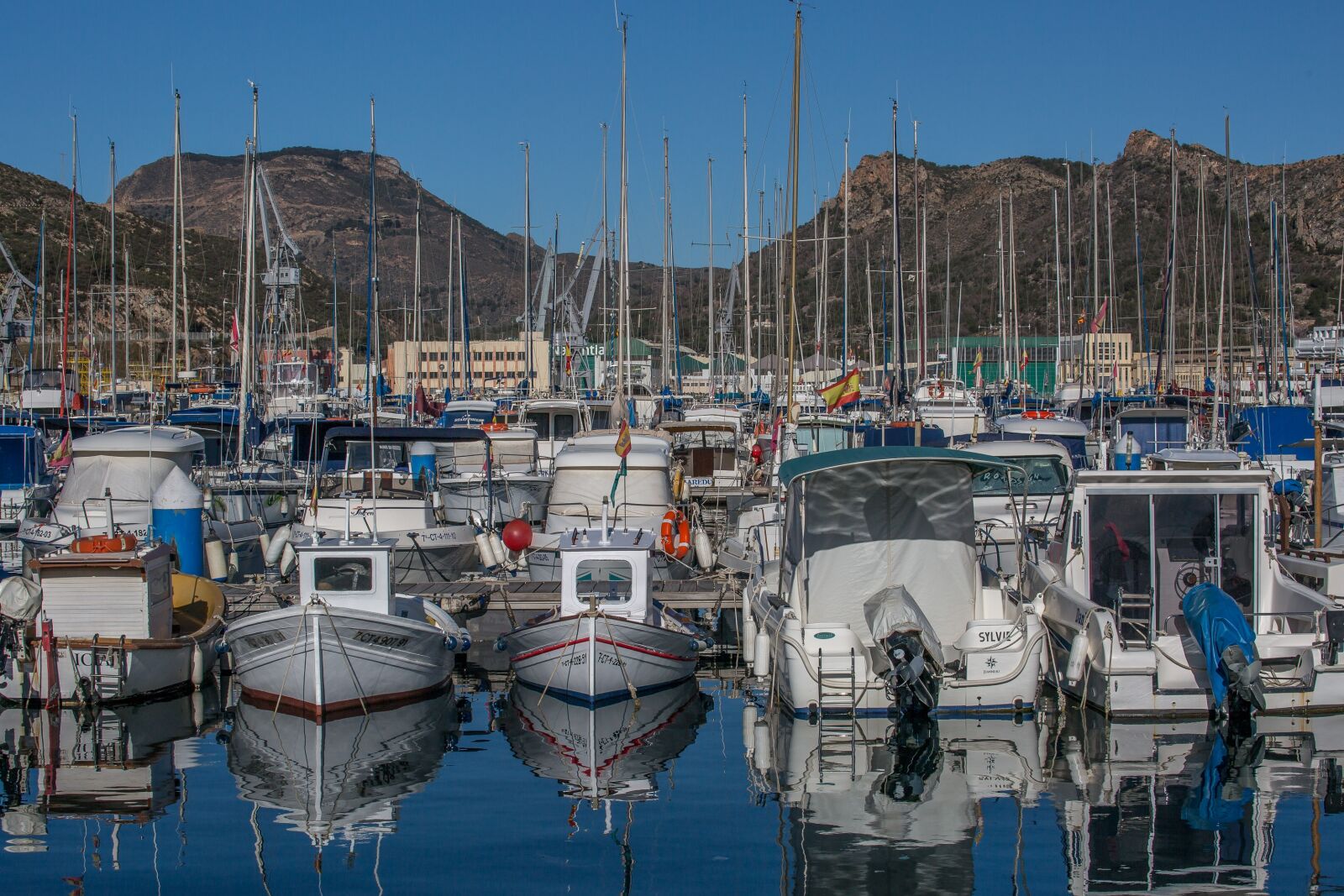 Canon EOS 5D Mark III + Canon EF 70-300mm F4-5.6L IS USM sample photo. Reflections, boats, water photography