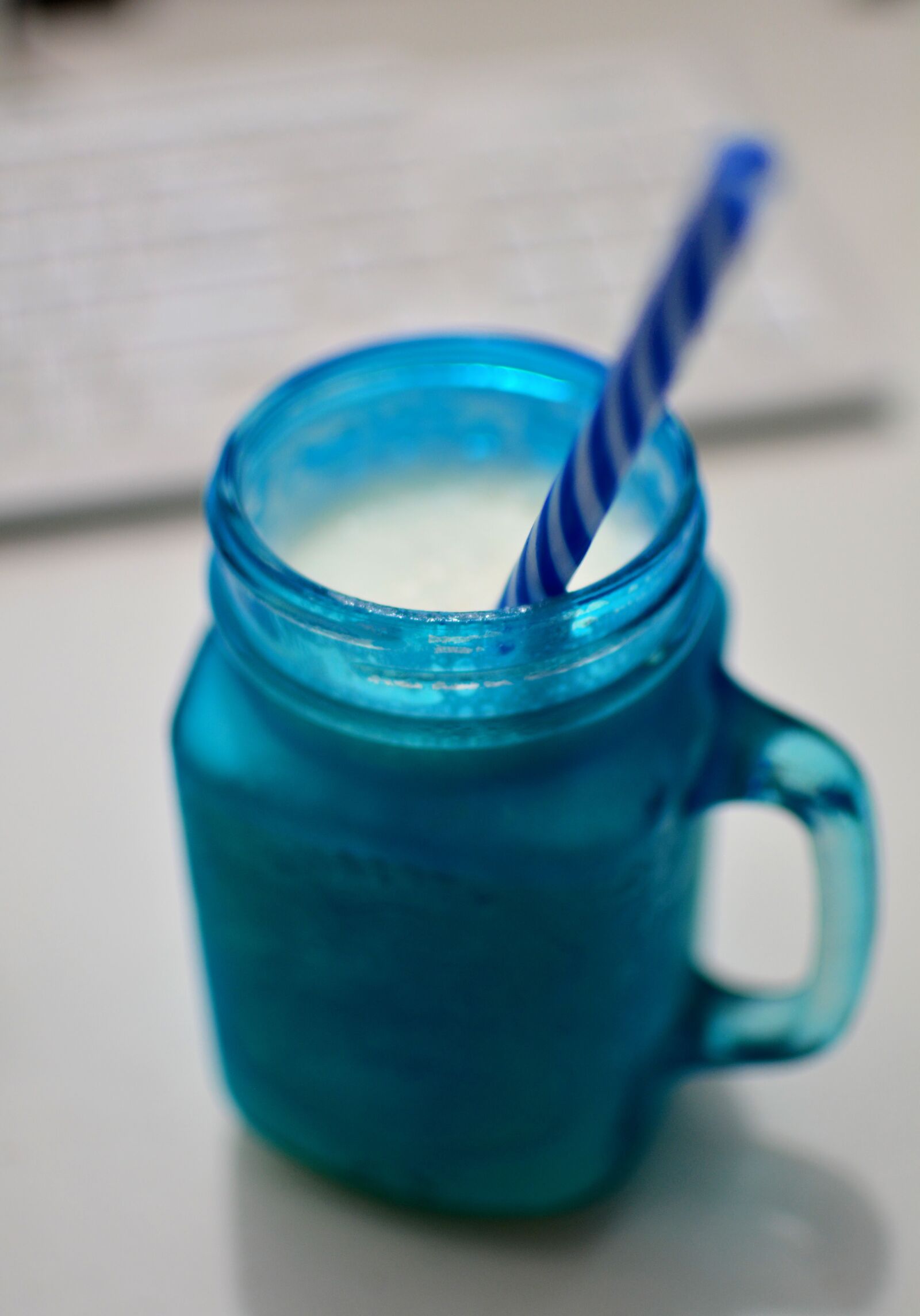 Nikon D5200 sample photo. Mug with straw, milk photography
