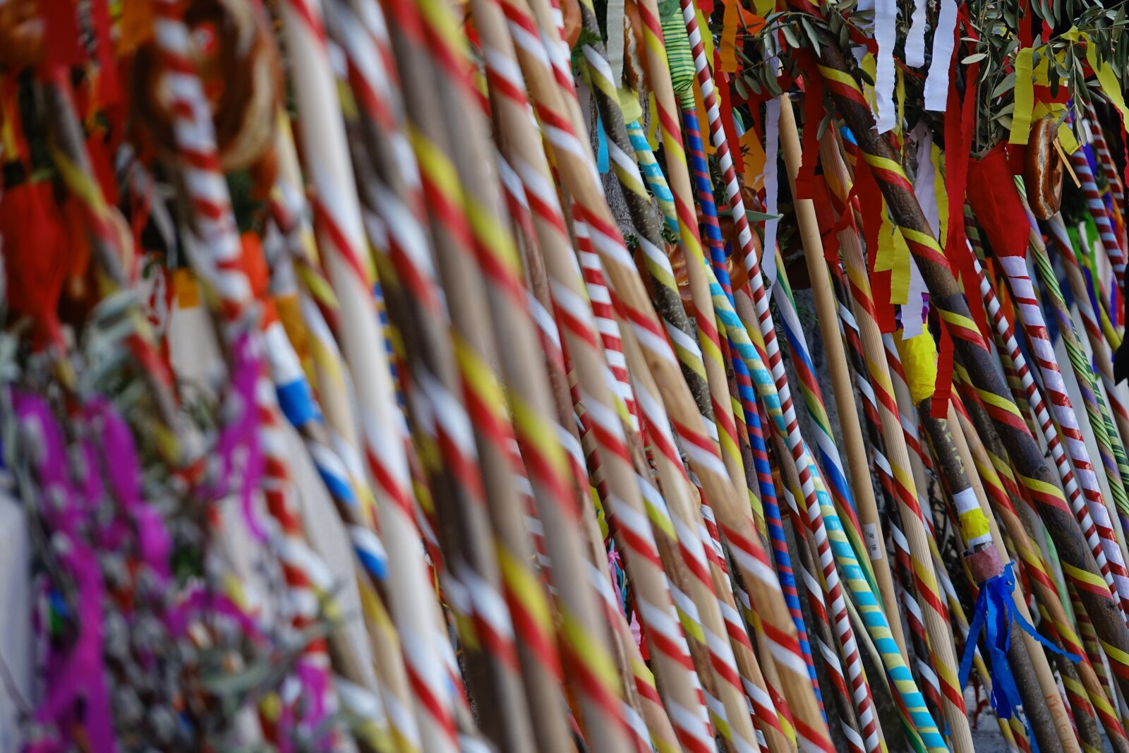 Sony Cyber-shot DSC-RX10 III sample photo. Colors, confetti, sticks photography