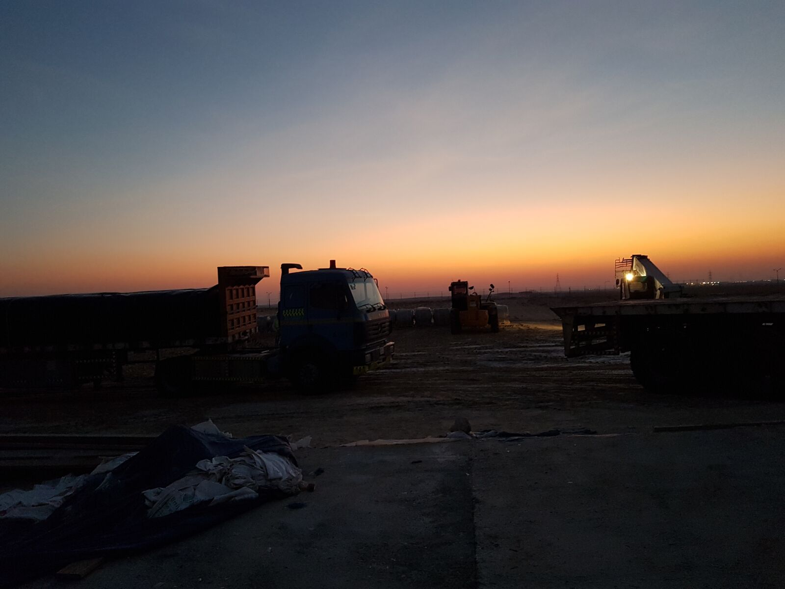 Samsung Galaxy Note Fan Edition sample photo. Men at work, sunset photography