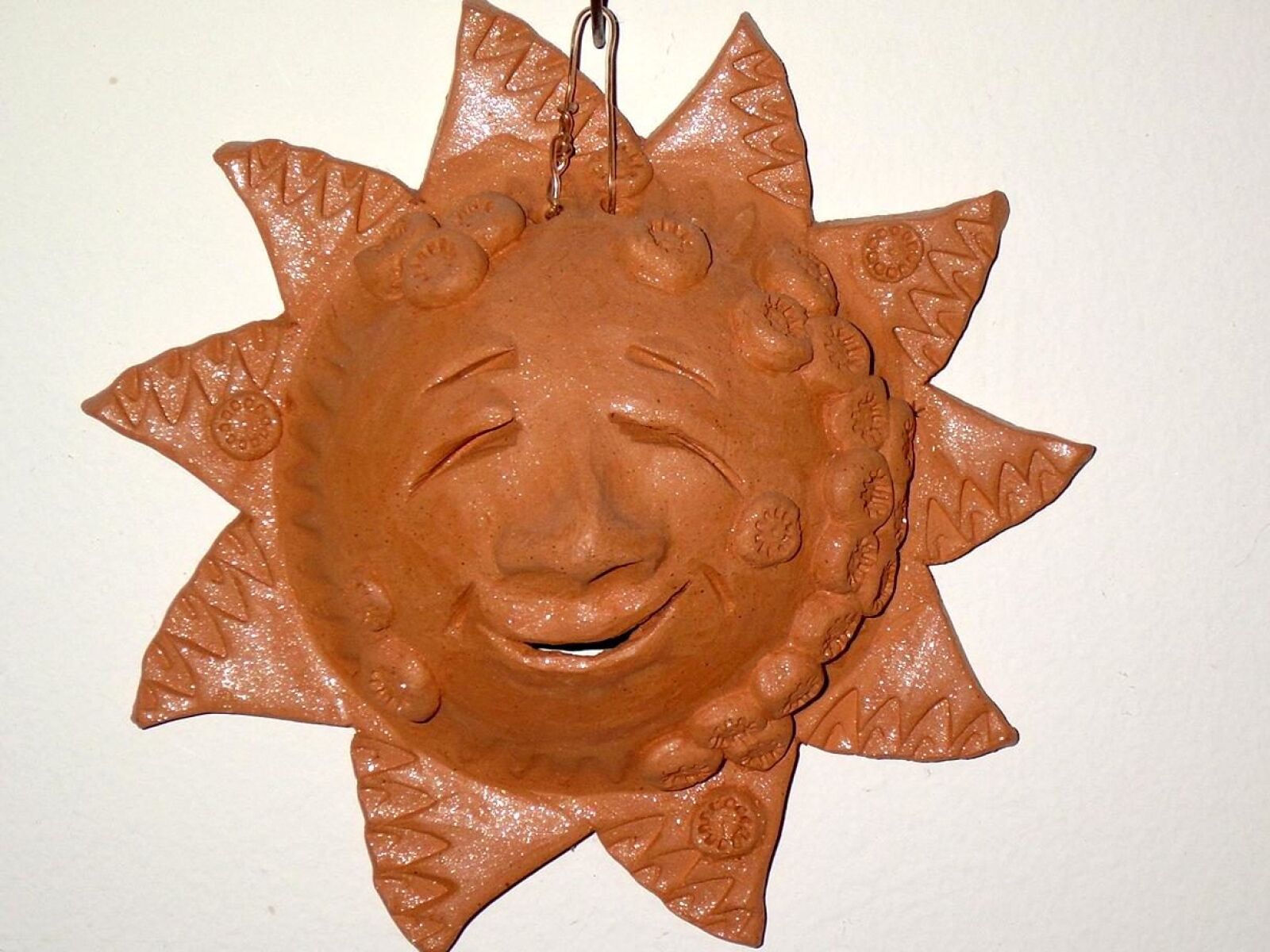Sony DSC-P10 sample photo. Terracotta, sun, ornament, decoration photography