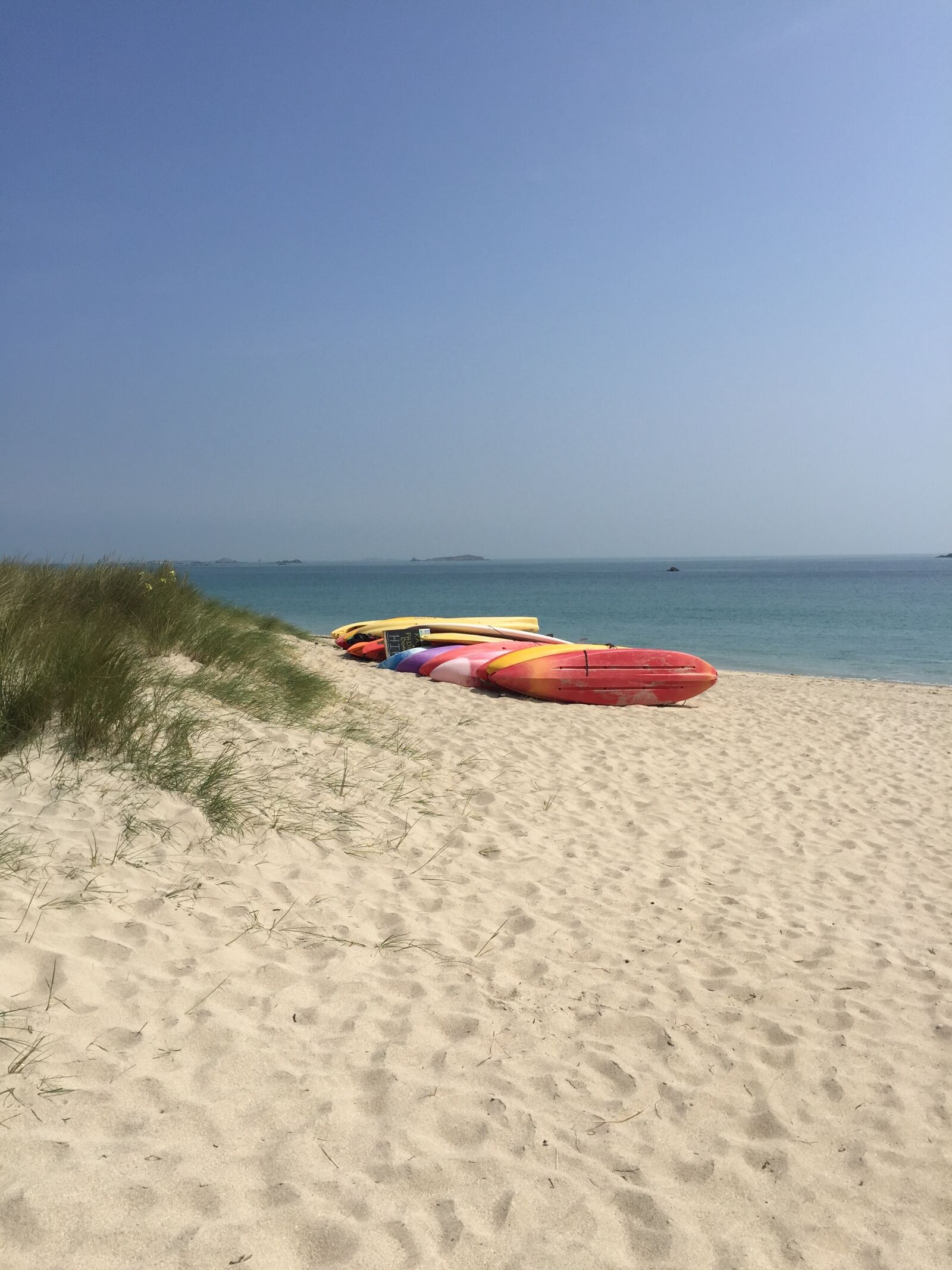 Apple iPhone 6 sample photo. Canoes, colourful, sandy, beach photography