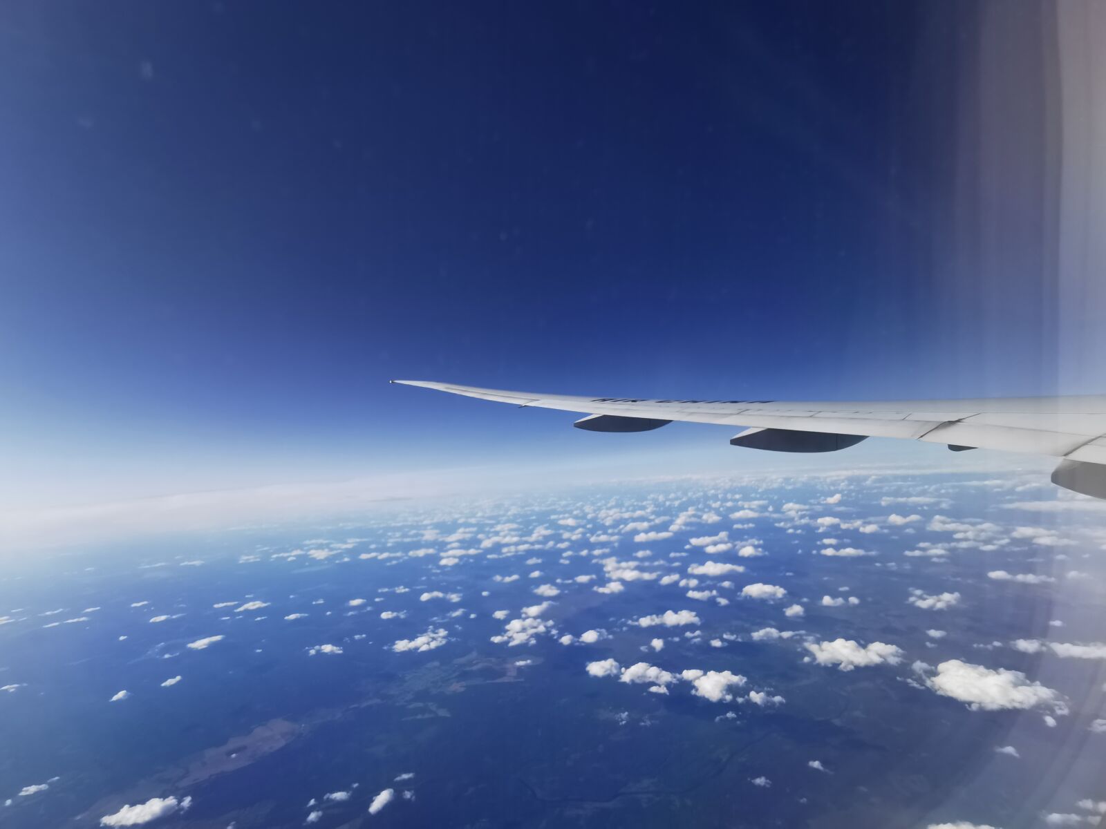 HUAWEI P30 Pro sample photo. Aircraft, clouds, sea photography